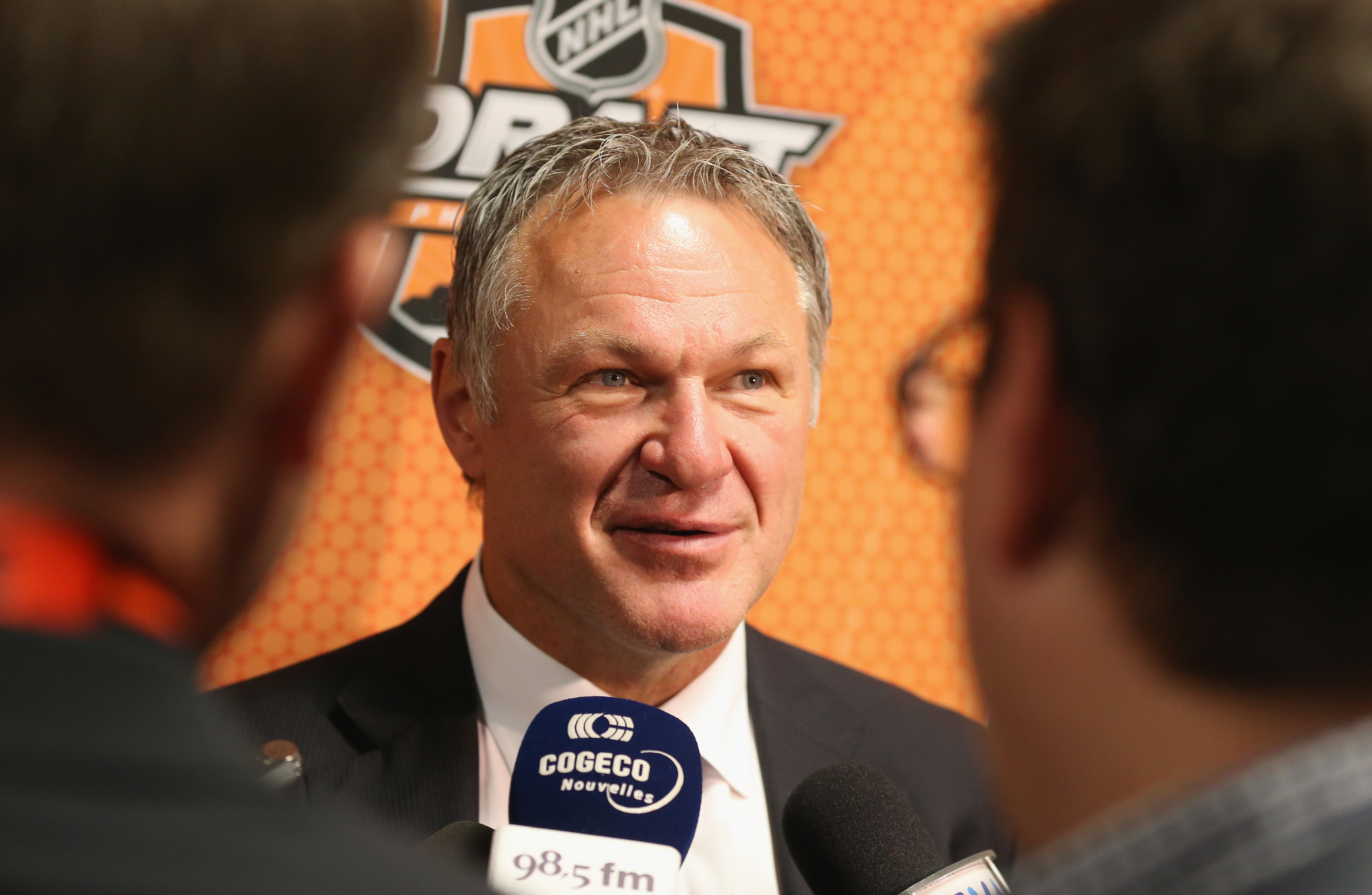 Claude Lemieux speaks to the media on Day Two of the NHL Draft on June 28, 2014 | Source: Getty Images