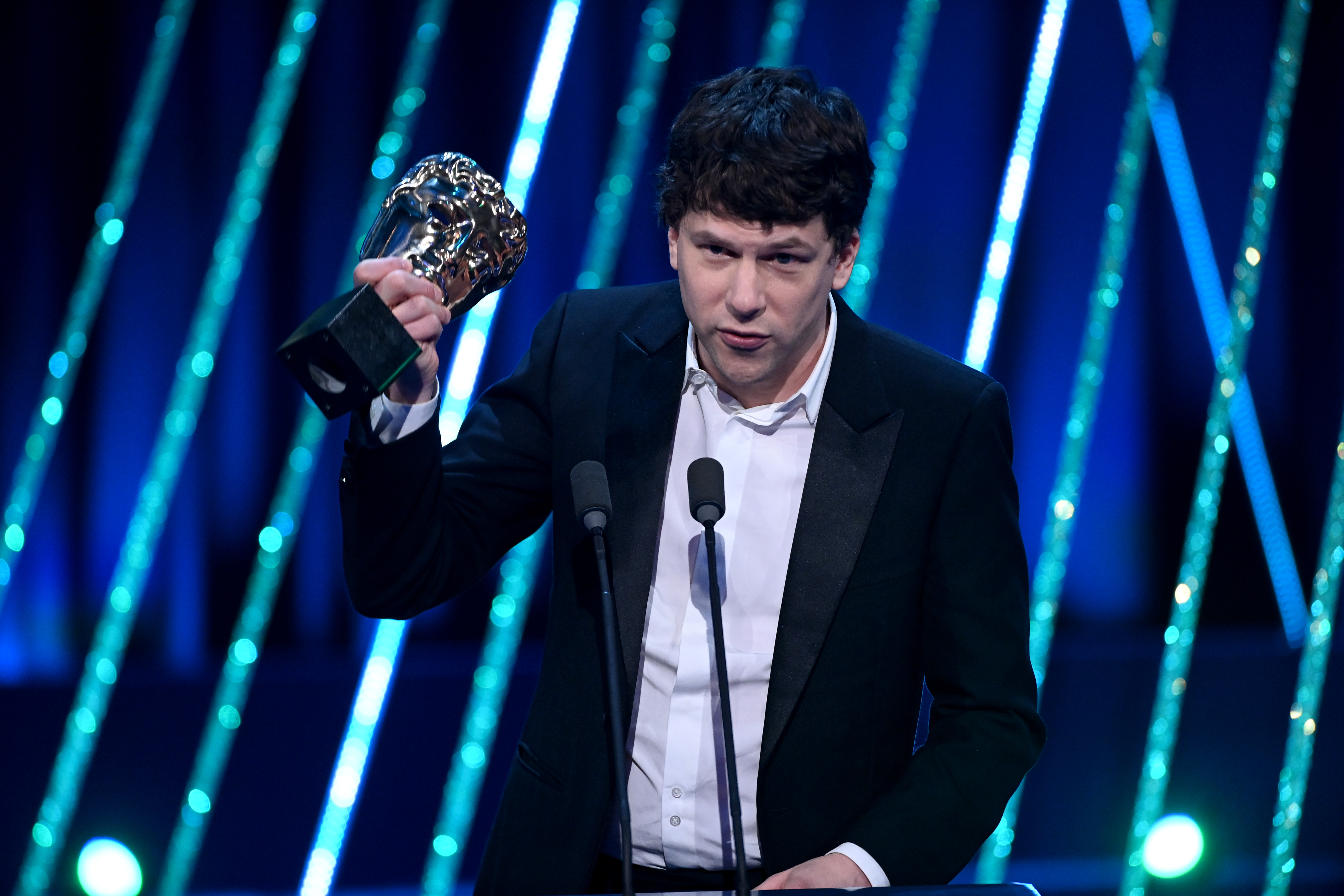 Jesse Eisenberg accepts the Supporting Actor Award, on behalf of Kieran Culkin on February 16, 2025 | Source: Getty Images