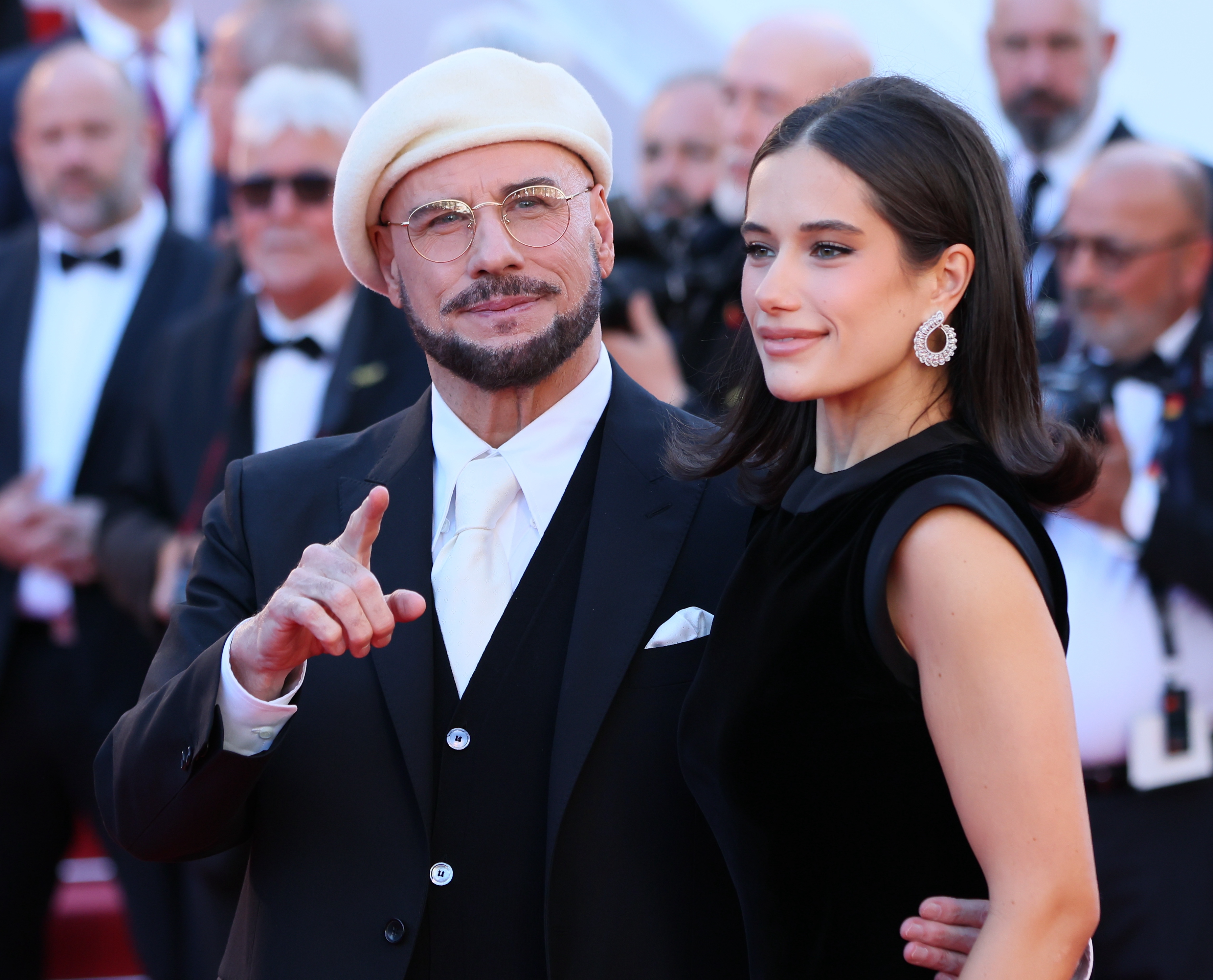 John and Ella Bleu Travolta attend the "Karma" screening during the 79th annual Cannes Film Festival at Palais des Festivals on May 15, 2026 in Cannes, France. | Source: Getty Images