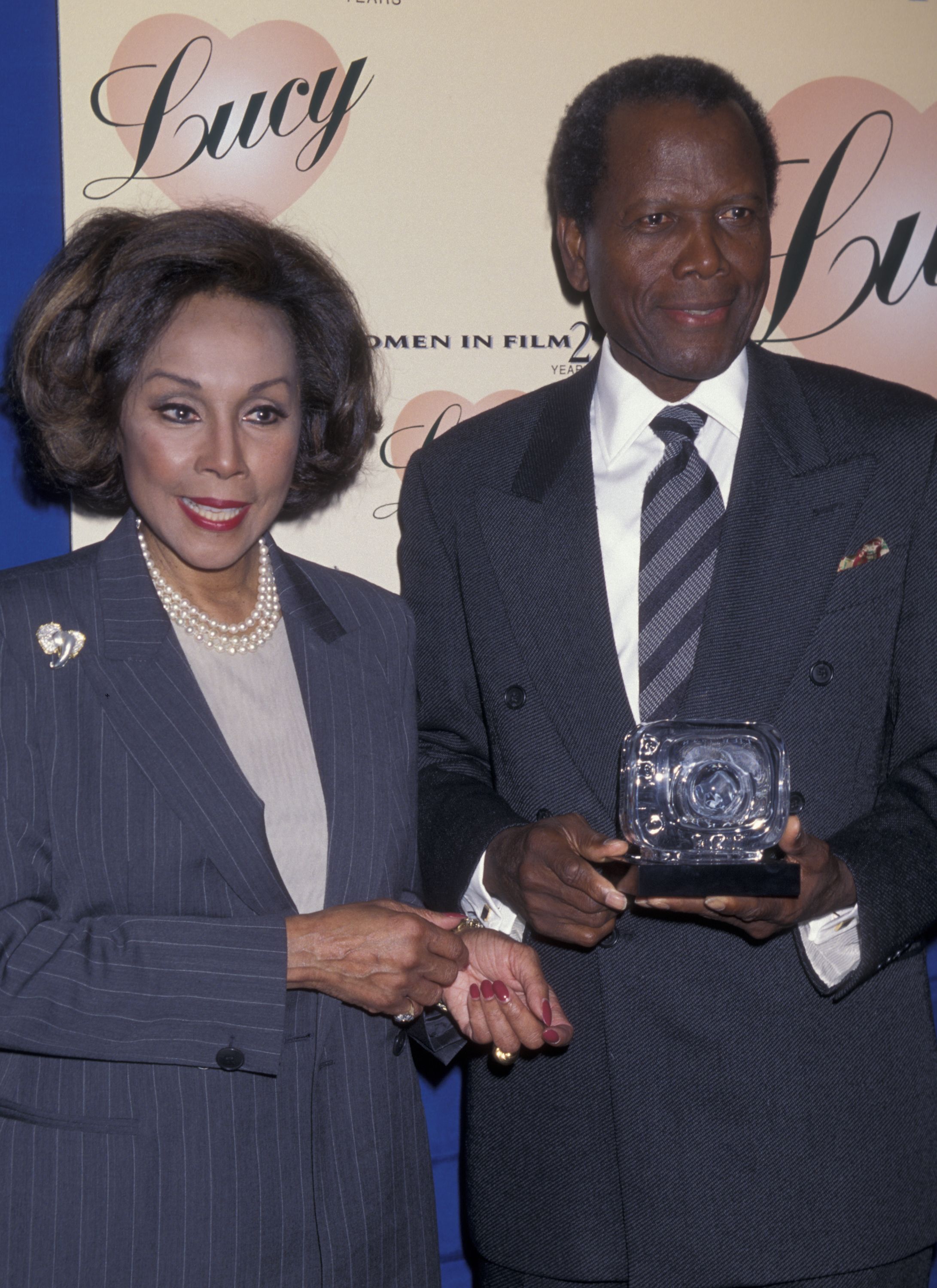 Diahann Carroll and Sidney Poitier during the Fifth Annual Women in Film Lucy Awards on September 12, 1998 at the Beverly Wilshire Hotel in Beverly Hills, California. | Source: Getty Images