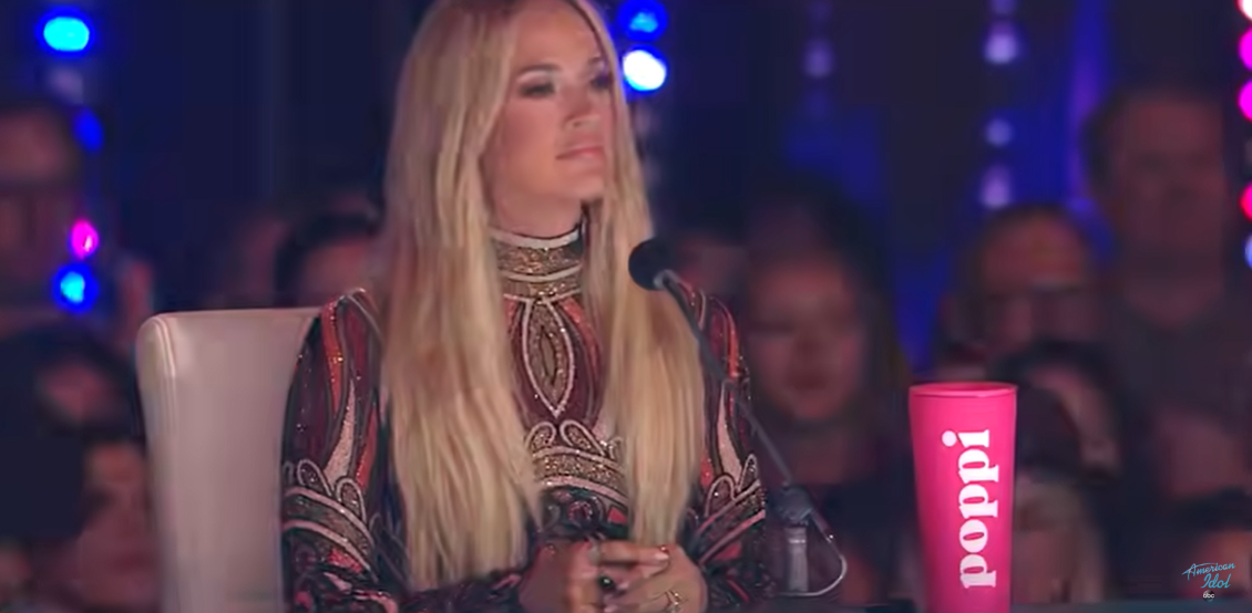 Carrie Underwood watches from the judges' table during Miranda Lambert's live performance on American Idol | Source: YouTube/AmericanIdol