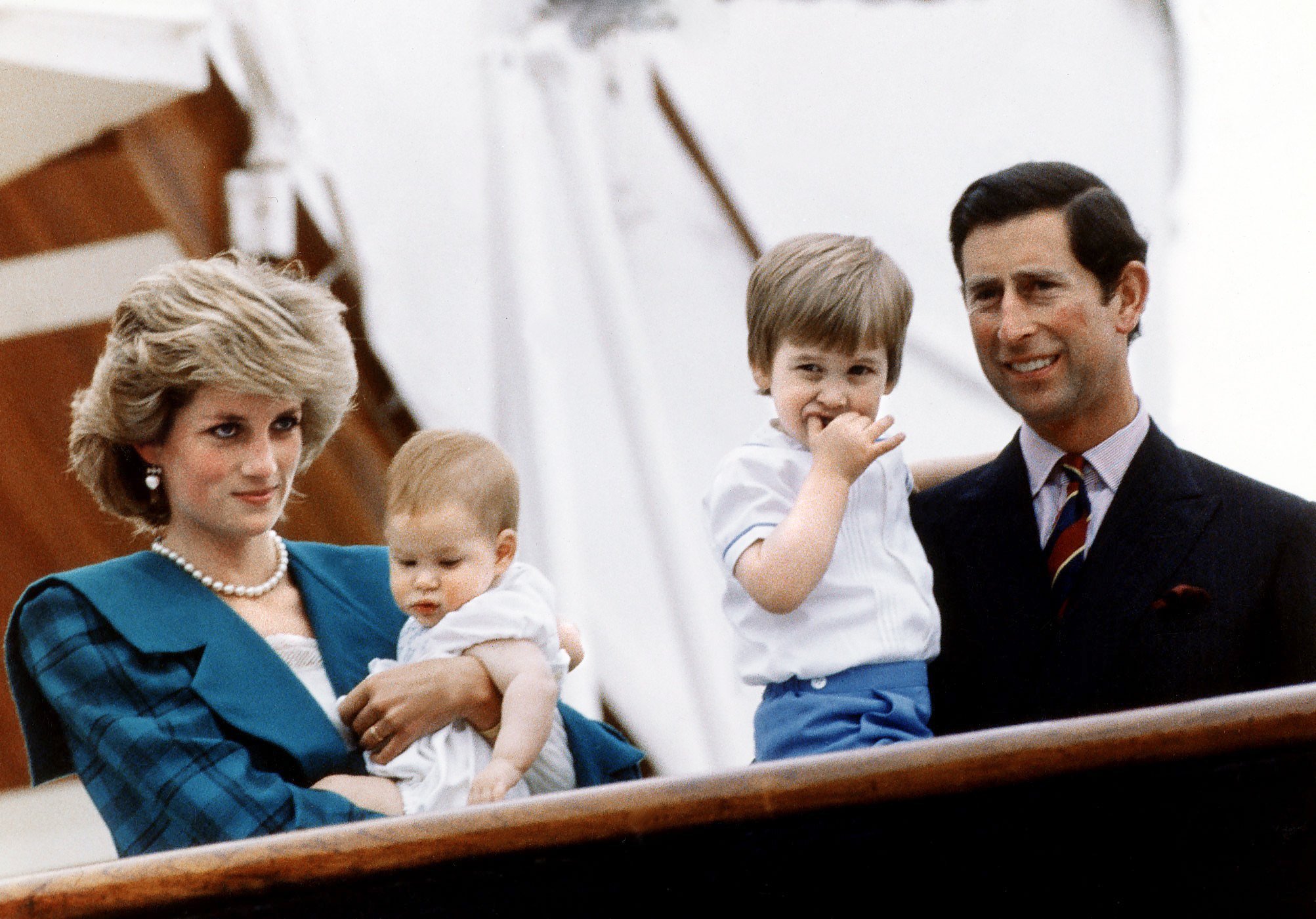 Princess Diana and King Charles pose with their sons Princes Harry and William on board royal yacht Britannia during their visit to Venice, Italy, 6th May 1985 | Source: Getty Images