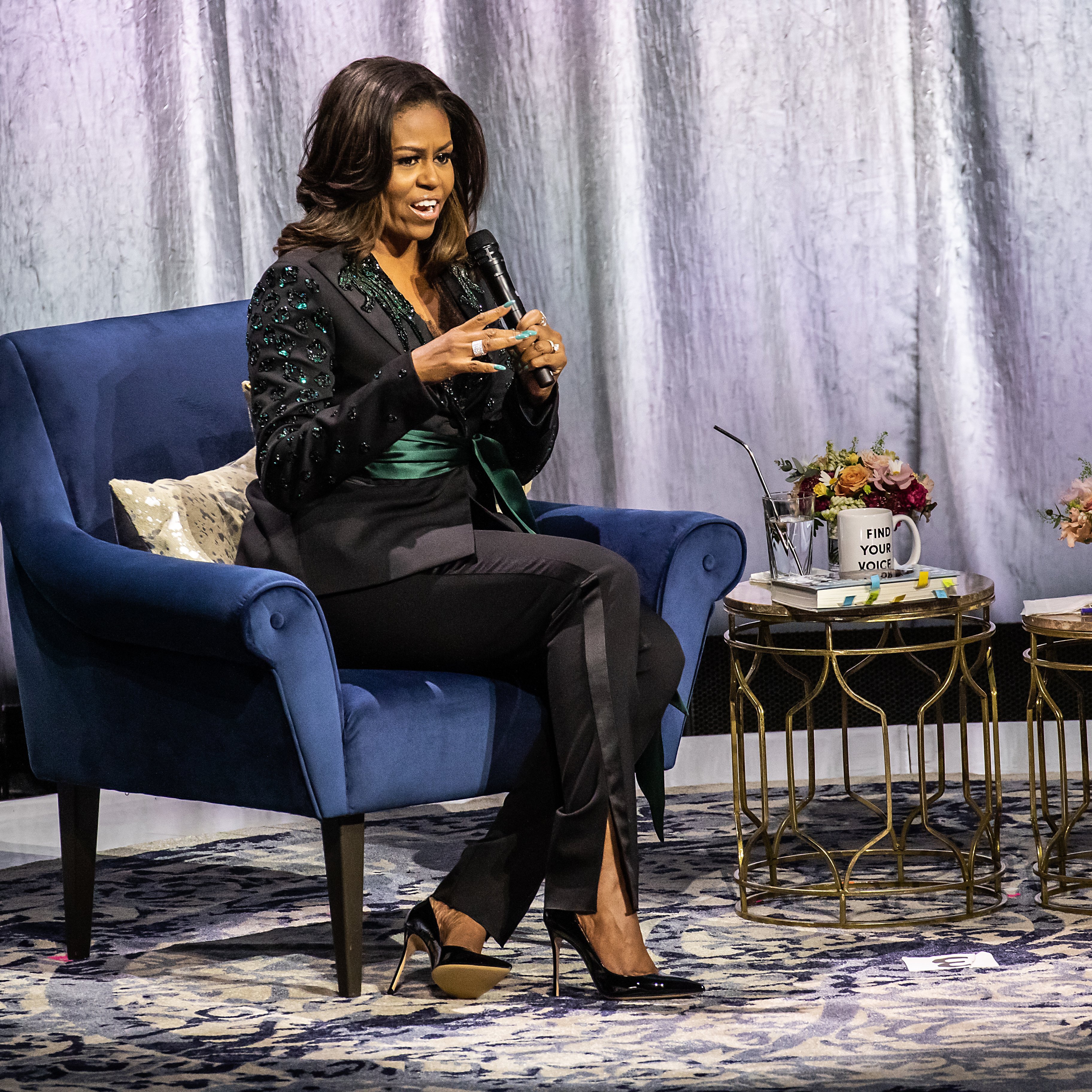 Michelle Obama held a conversation with Phoebe Robinson about her book "Becoming" at Oslo Spektrum on April 11, 2019, in Oslo, Norway. | Source: Getty Images.