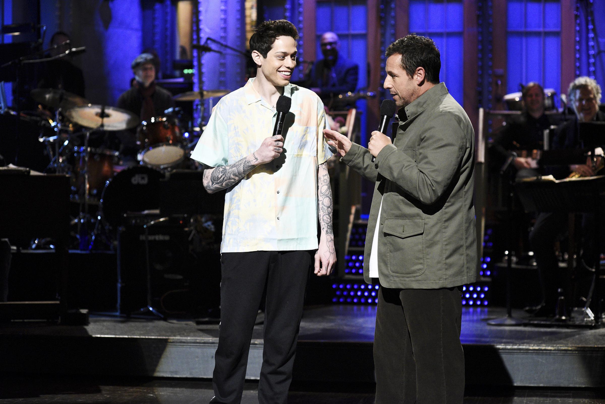 Pete Davidson appears with host Adam Sandler during the "I Was Fired" monologue on "Saturday Night Live" on May 4, 2019 | Source: Getty Images