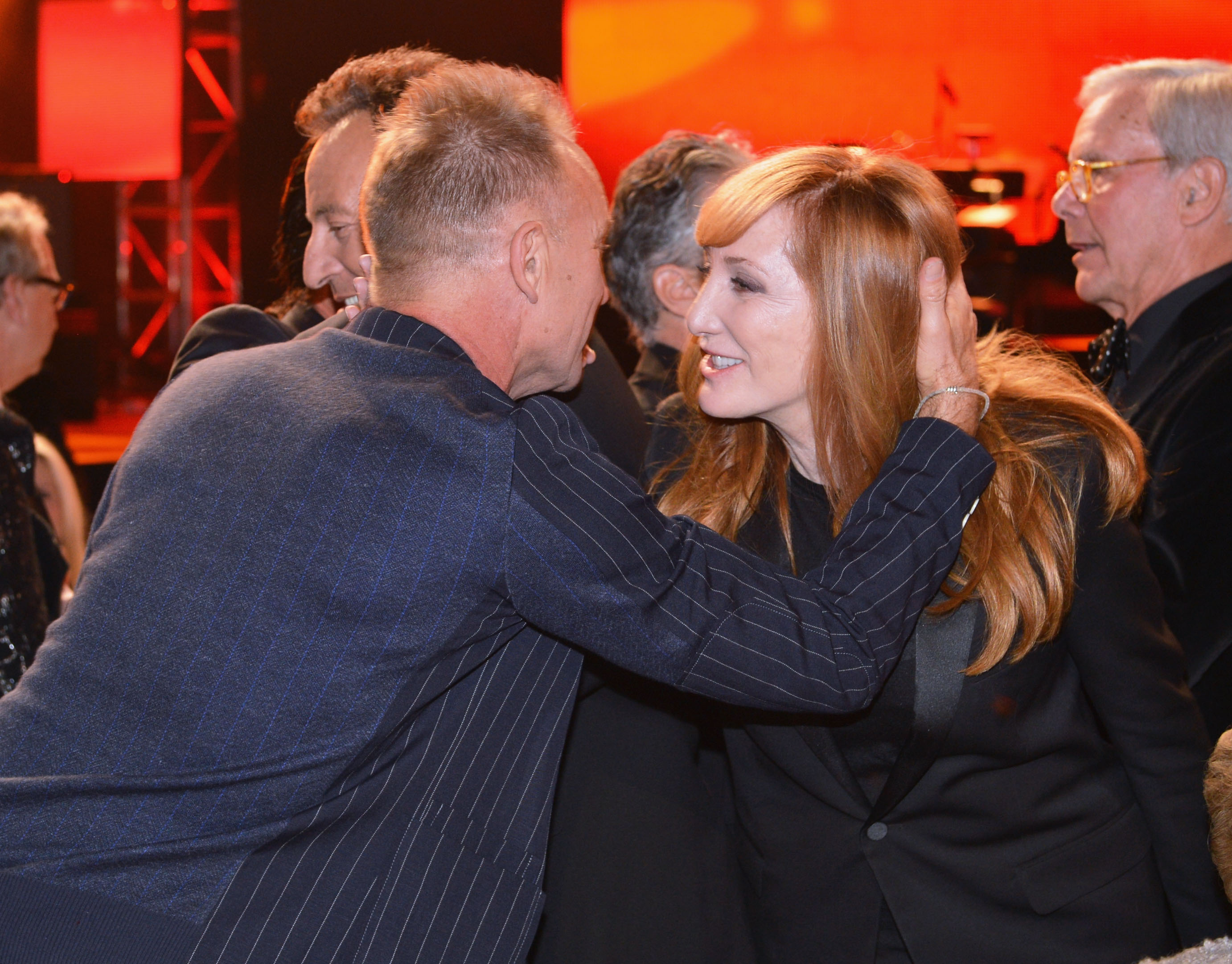 At the 2013 MusiCares Person of the Year event honoring Bruce Springsteen, Sting and Patti Scialfa are seen together at the Los Angeles Convention Center. Both dressed elegantly, the longtime friends gathered to celebrate Springsteen’s musical legacy and philanthropic impact.