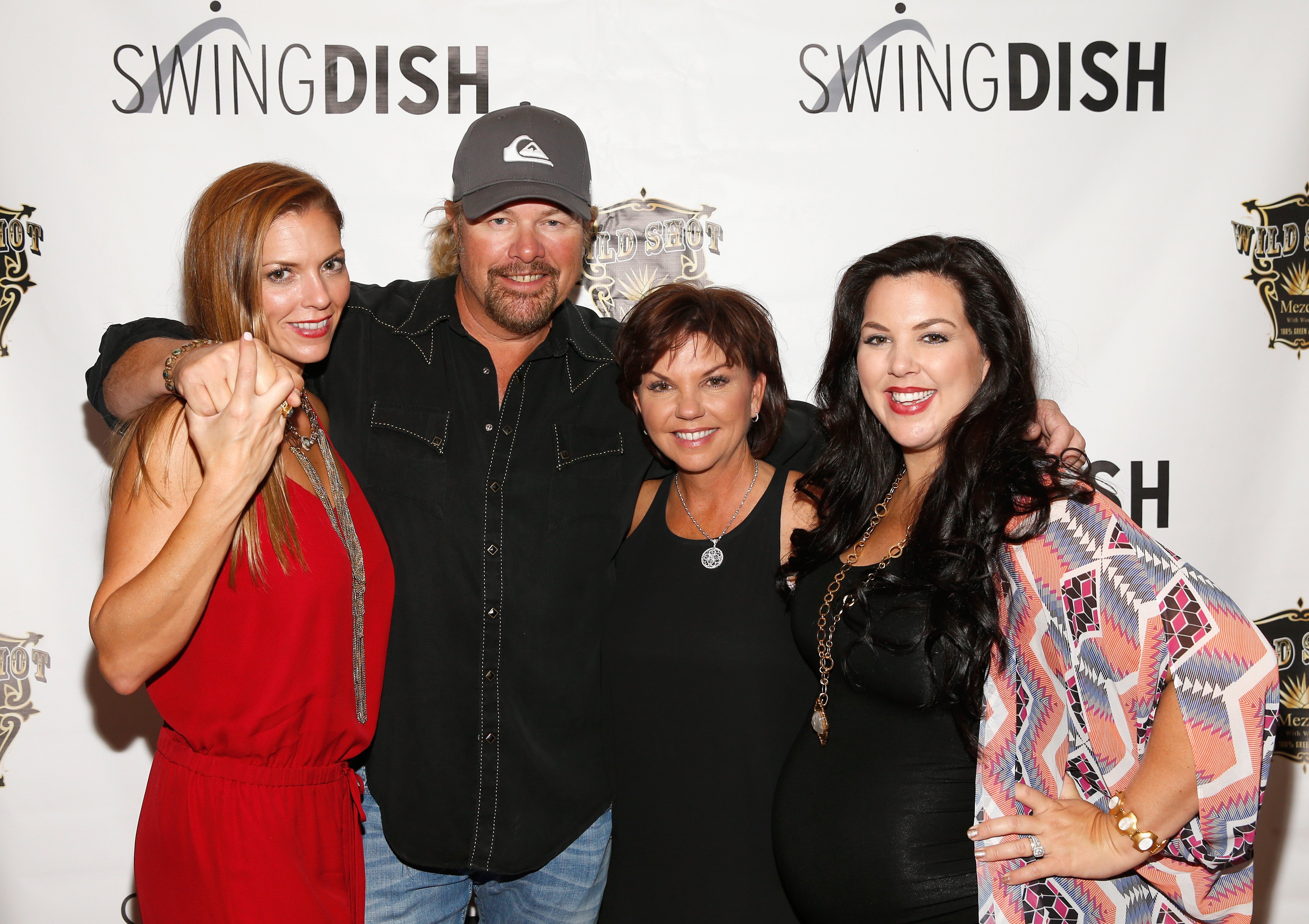 Shelley Rowland, Toby Keith, Tricia Covel, and Krystal Keith Covel at the SwingDish Launch Event on August 18, 2015 | Source: Getty Images