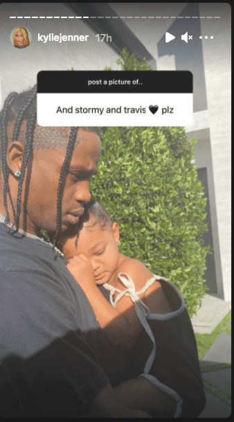 A picture of Travis Scott carrying his babygirl Stormi on his chest while she is sleeping. | Photo: Instagram/Kyliejenner