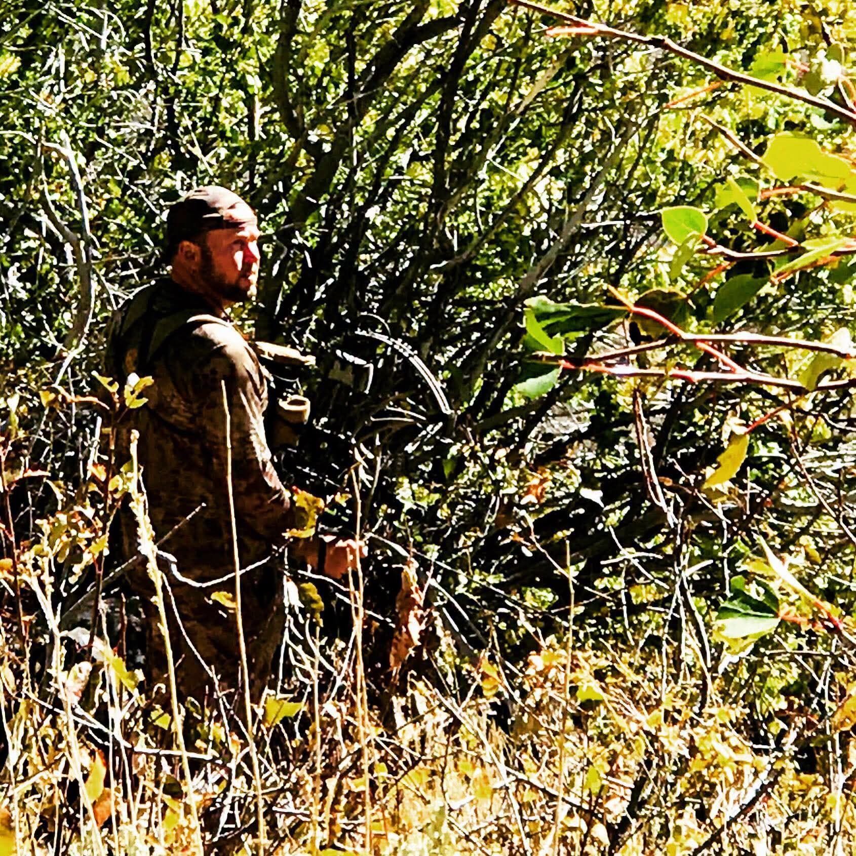 Christopher Claunch, one of the victims of the In-N-Out shooting in Idaho, in a photo while hunting outdoors, posted on August 3, 2026. | Source: Facebook/William Mostoller for Idaho