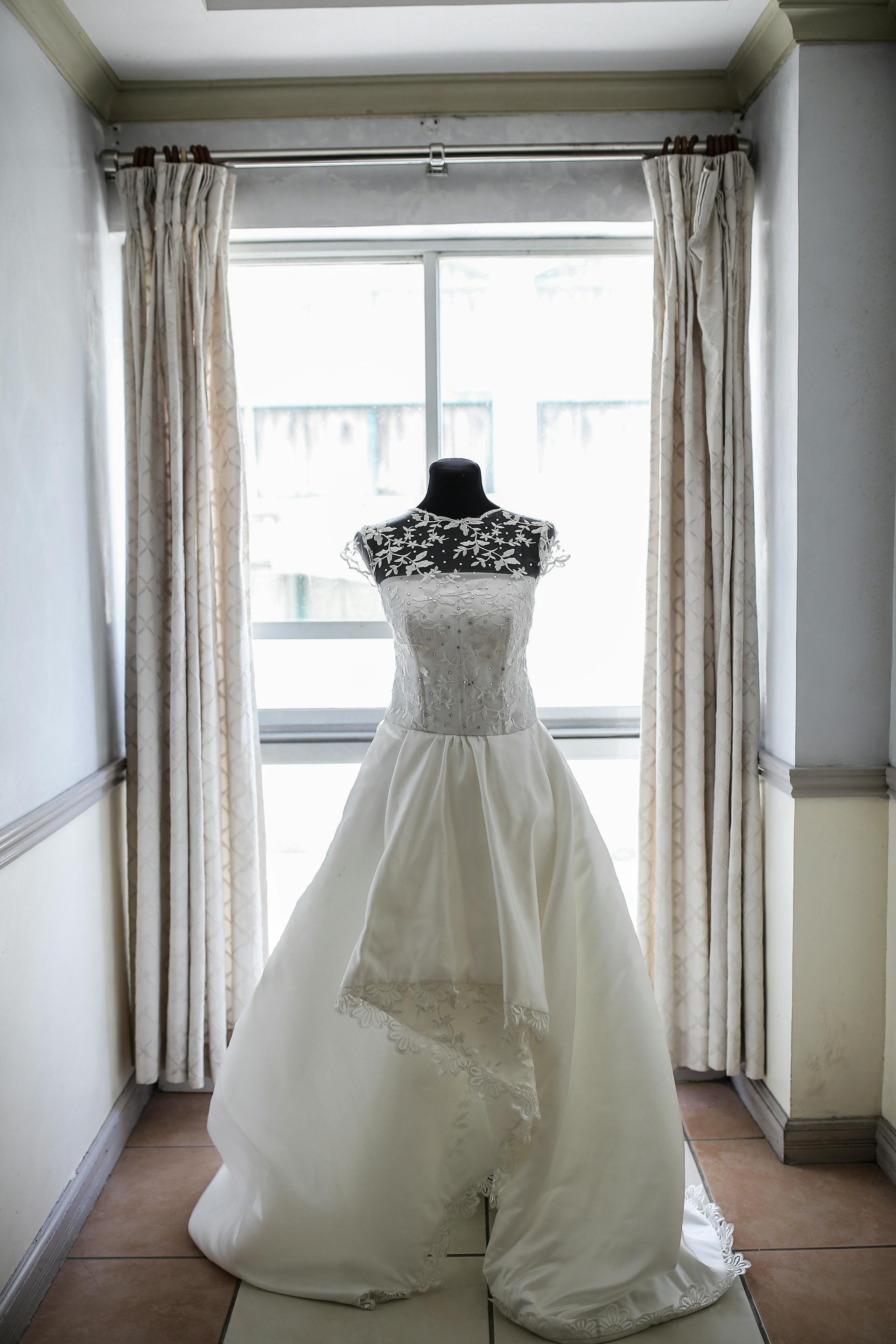 A wedding gown on a mannequin | Source: Pexels