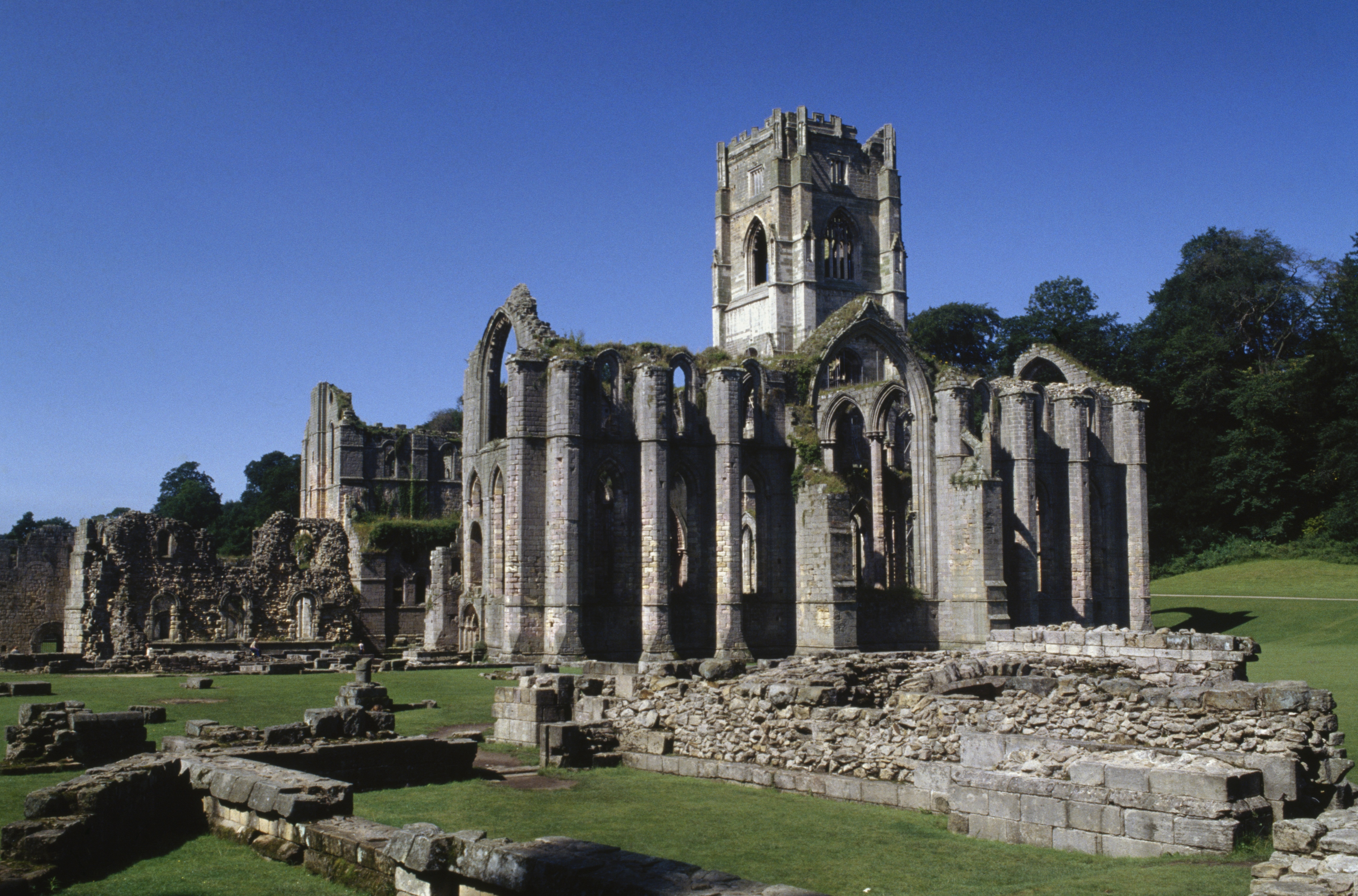 The ruins of Fountains Abbey, Cistercian Abbey, Studley Royal Park in England, United Kingdom. | Source: Getty Images