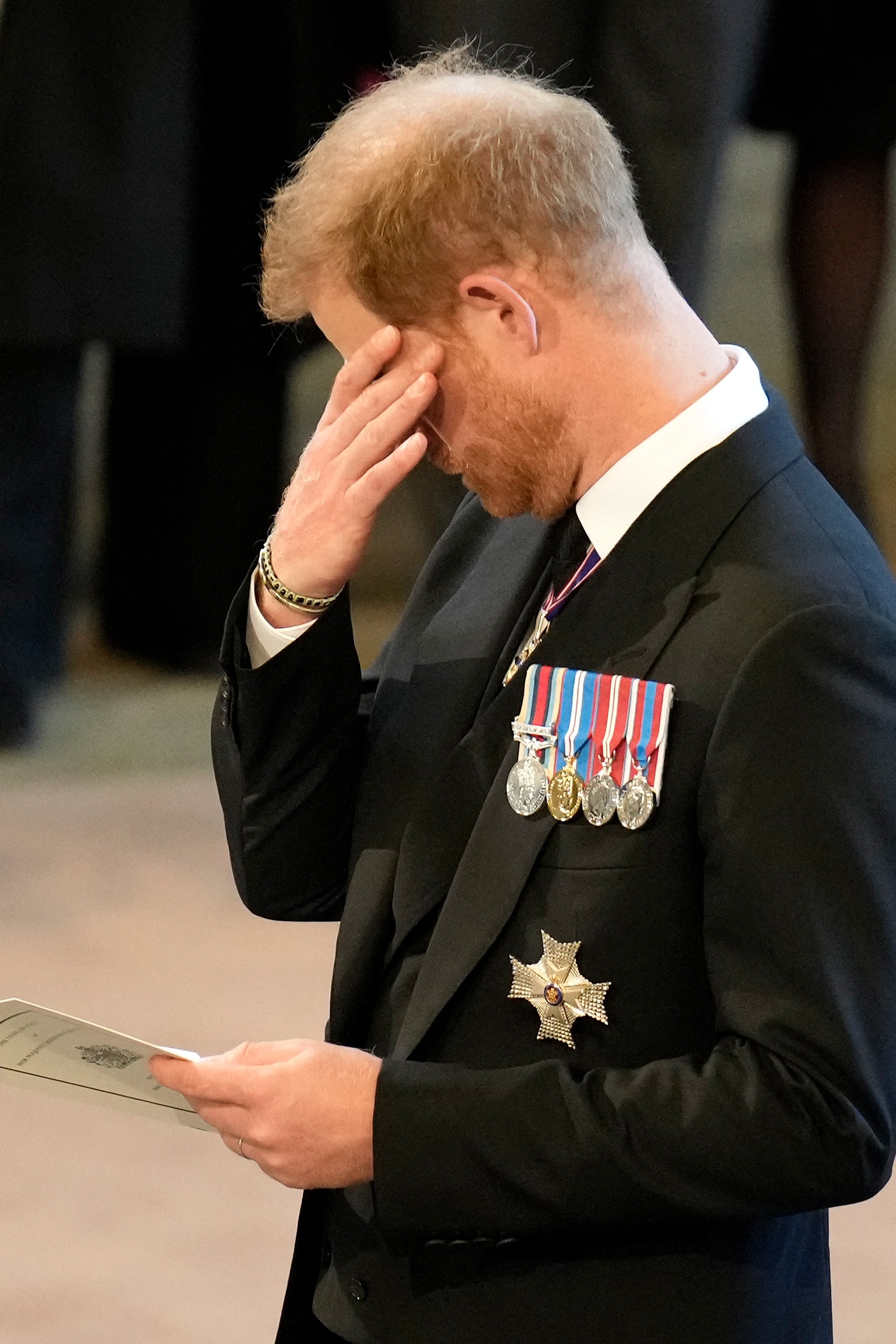 Britain's Prince Harry, Duke of Sussex at a service for the reception of Queen Elizabeth II's coffin inside Westminster Hall in London on September 14, 2022. | Source: Getty Images