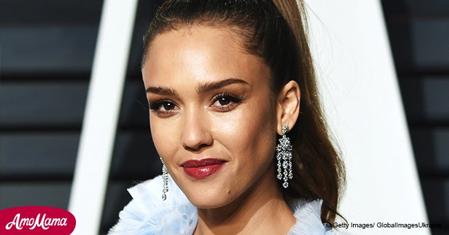 Jessica Alba, 36, puts on a glamourous display as she flaunts her slender body in a red suit
