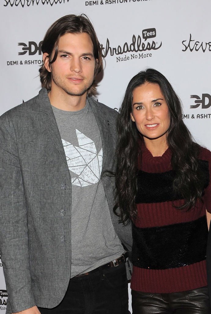 Ashton Kutcher und Demi Moore nehmen an der Eröffnungsparty für "Real Men Don't Buy Girls" teil. | Quelle: Getty Images