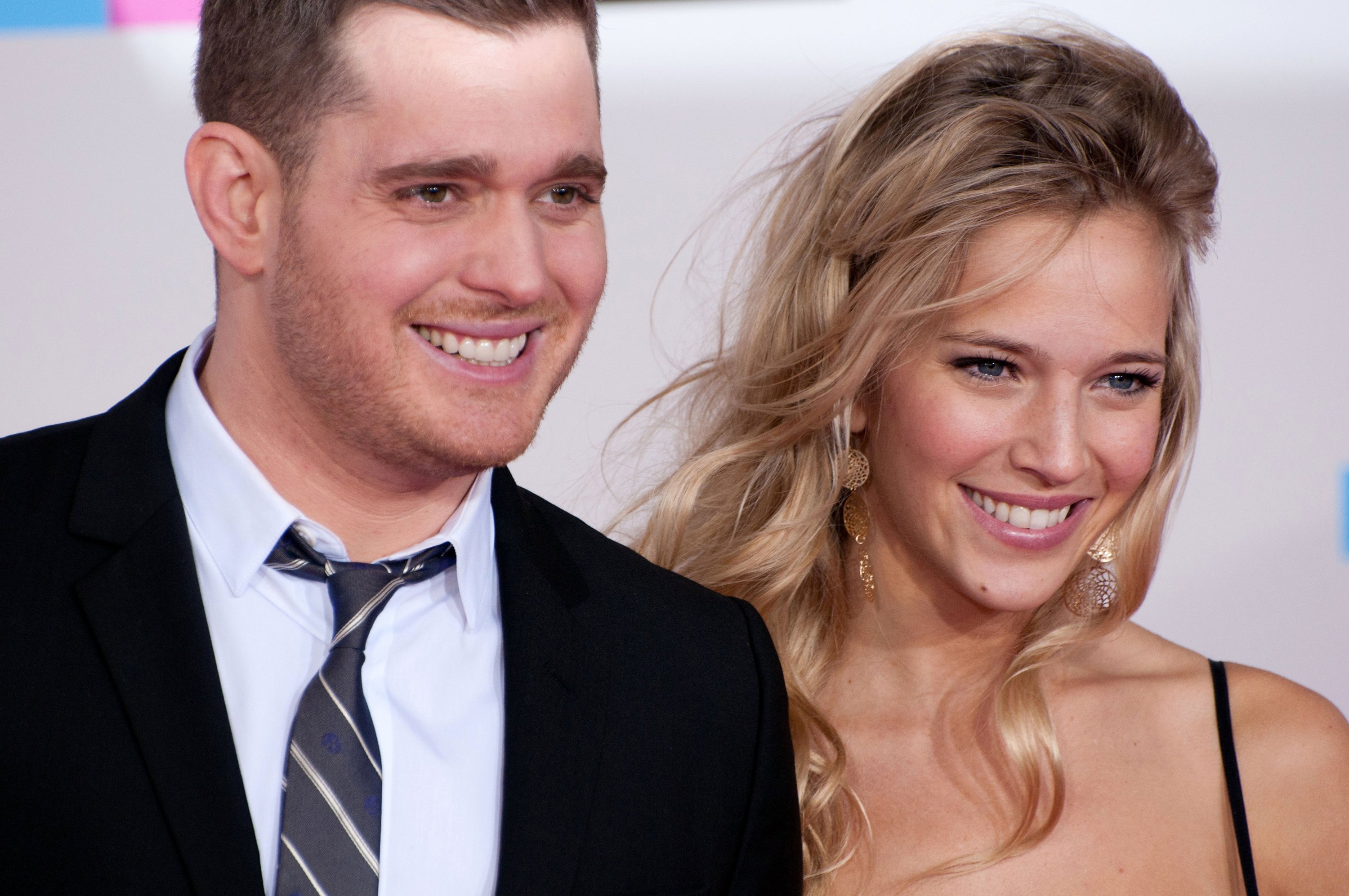 Michael Buble and Luisana Lopilato arrive at the 2010 American Music Awards held at Nokia Theatre L.A. Live on November 21, 2010 in Los Angeles, California | Source: Getty Images