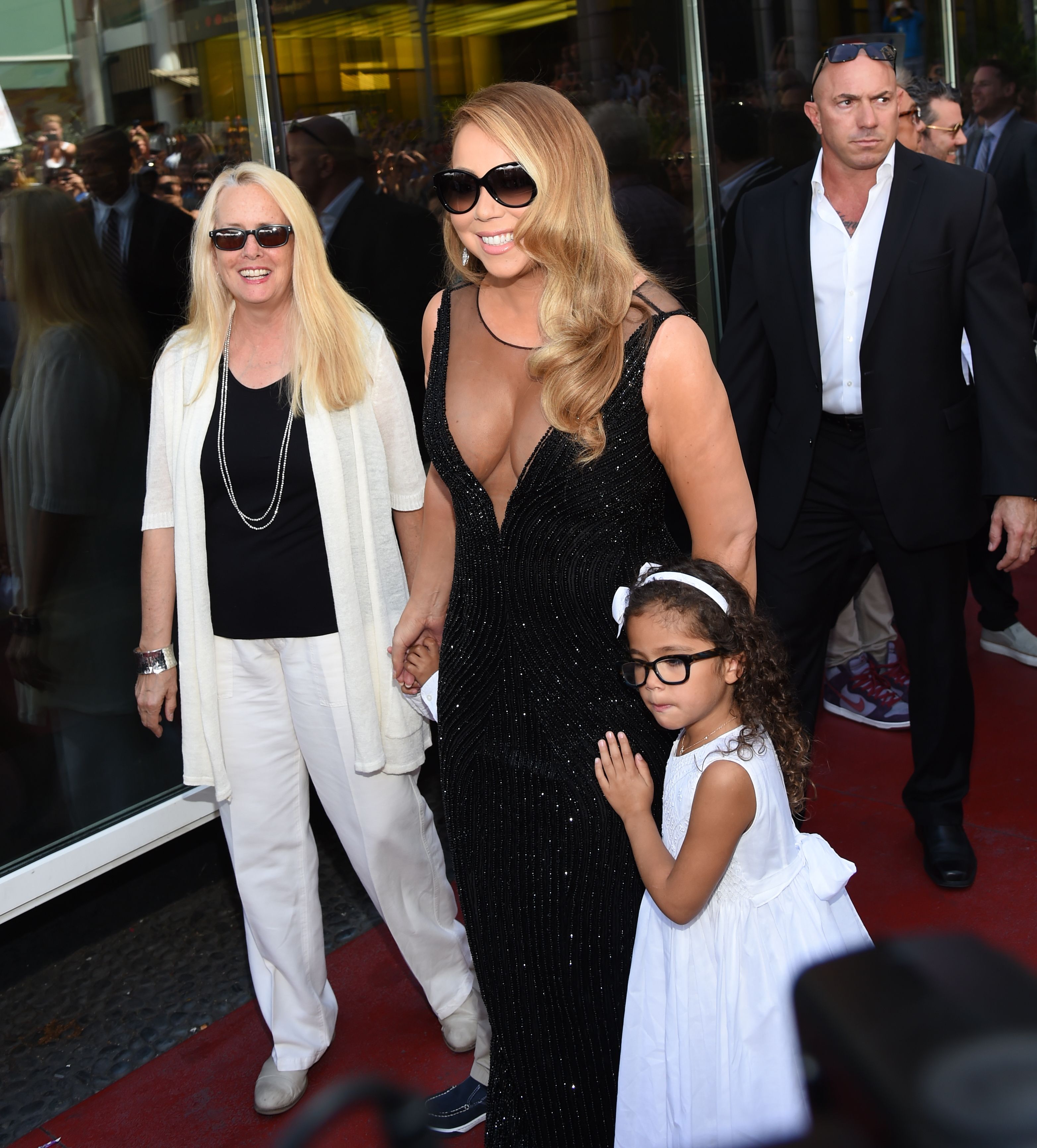 Patricia Hickey, Mariah Carey, and Moroccan and Monroe Cannon as Mariah is Mariah Carey honoured with star on Hollywood Walk of Fame, in Los Angeles, on August 5, 2015 | Source: Getty Images