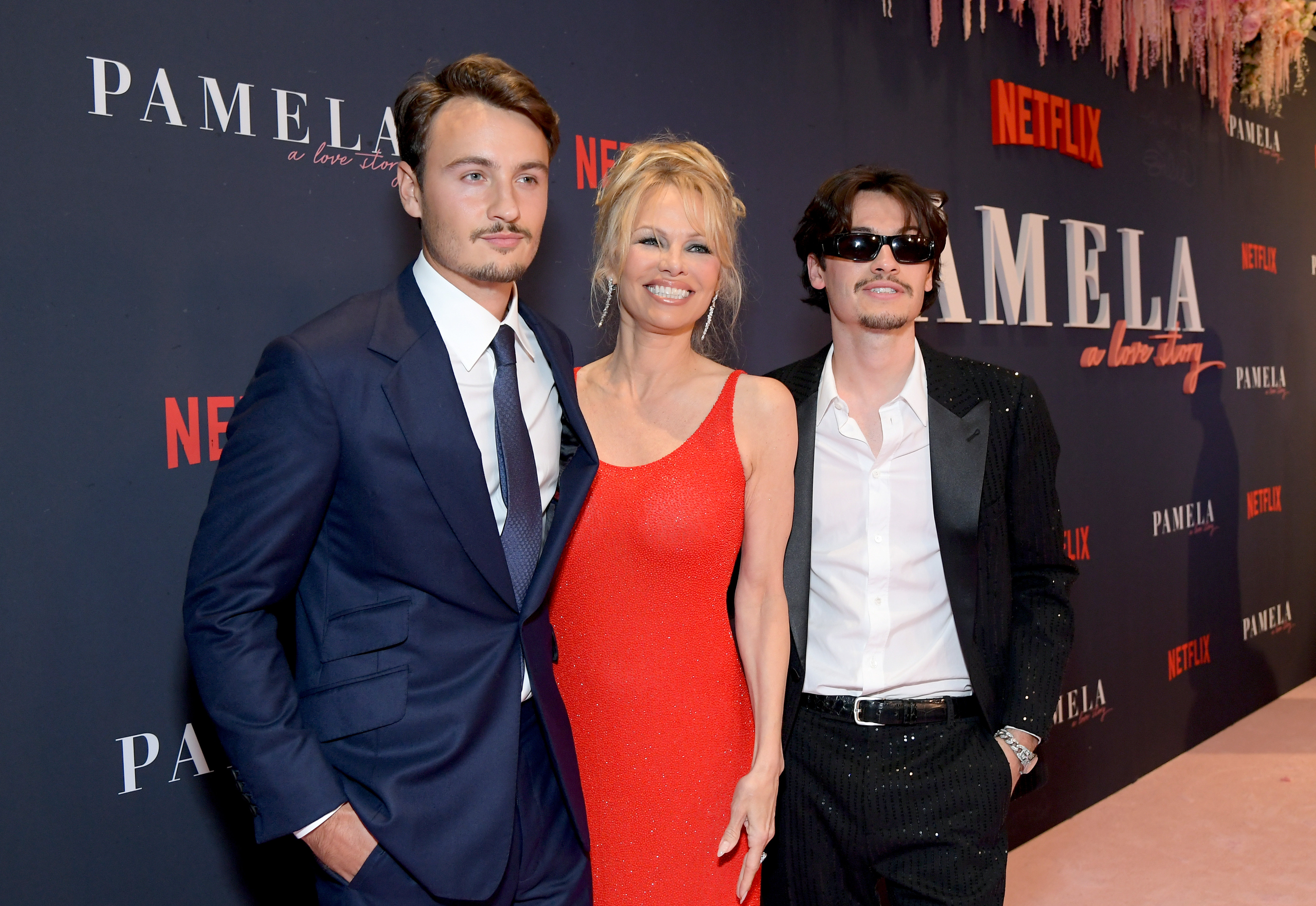 Pamela Anderson with Brandon and Dylan Lee at the premiere of Netflix's "Pamela, A Love Story" at Netflix Tudum Theater in Los Angeles, California on January 30, 2023 | Source: Getty Images