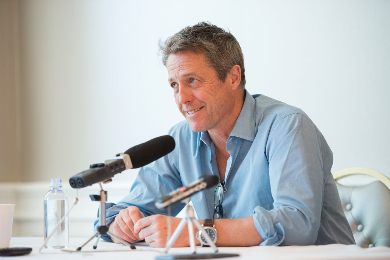 Hugh Grant in a press conference. | Source: Getty Images