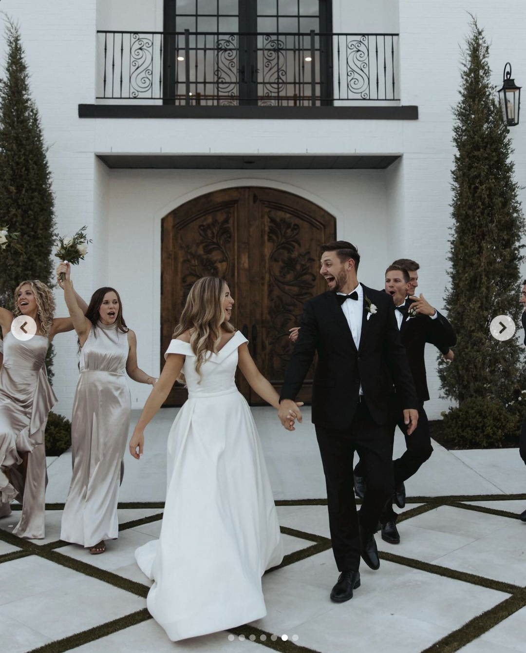 Jana Duggar and Stephen Wissmann walk hand-in-hand, with their bridesmaids and groomsmen on both sides, posted in August 2024 | Source: Instagram/janamduggar