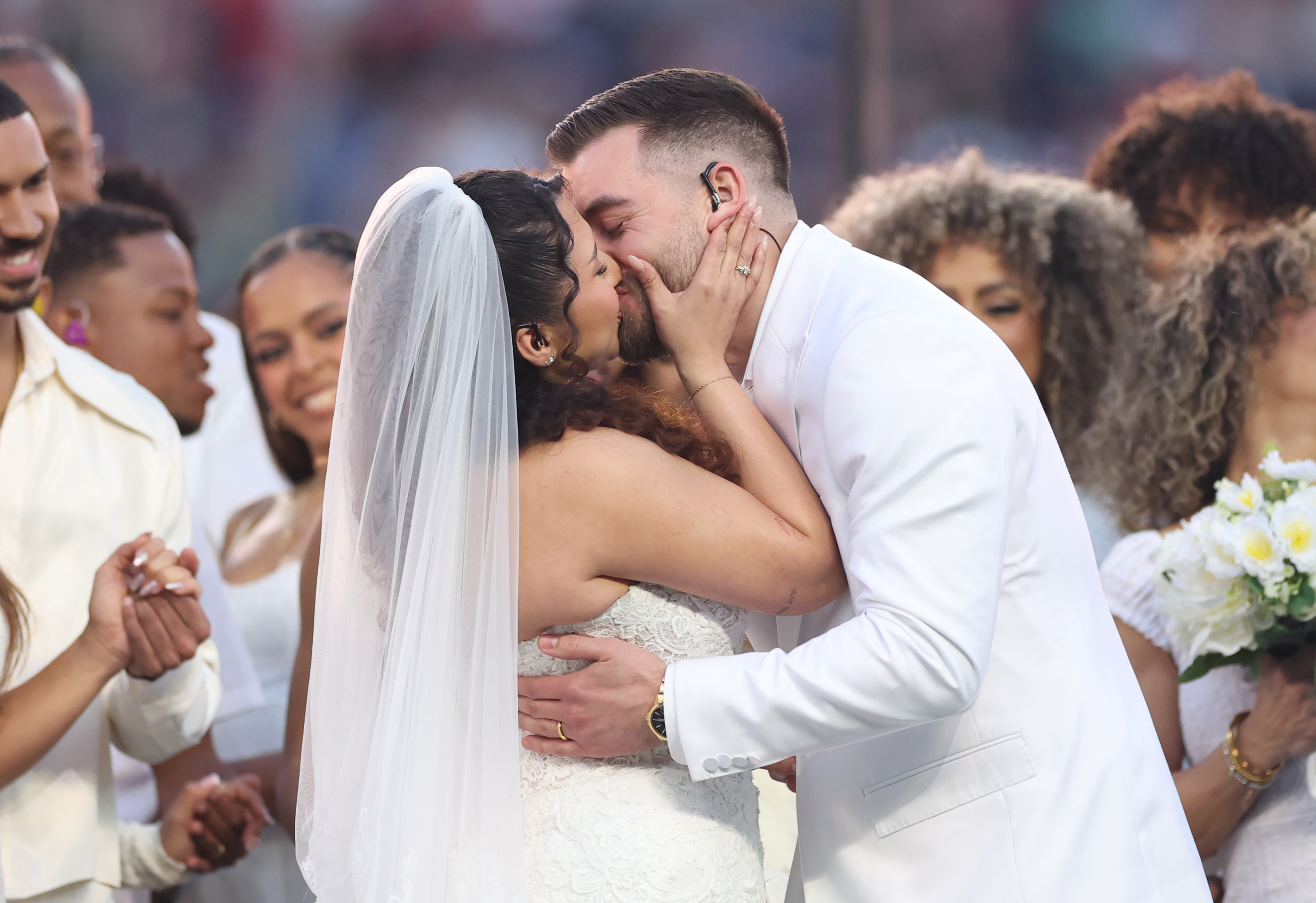A couple ties the knot during the Bad Bunny performance at the Apple Music Super Bowl LX Halftime Show on February 08, 2026 in Santa Clara, California | Source: Getty Images