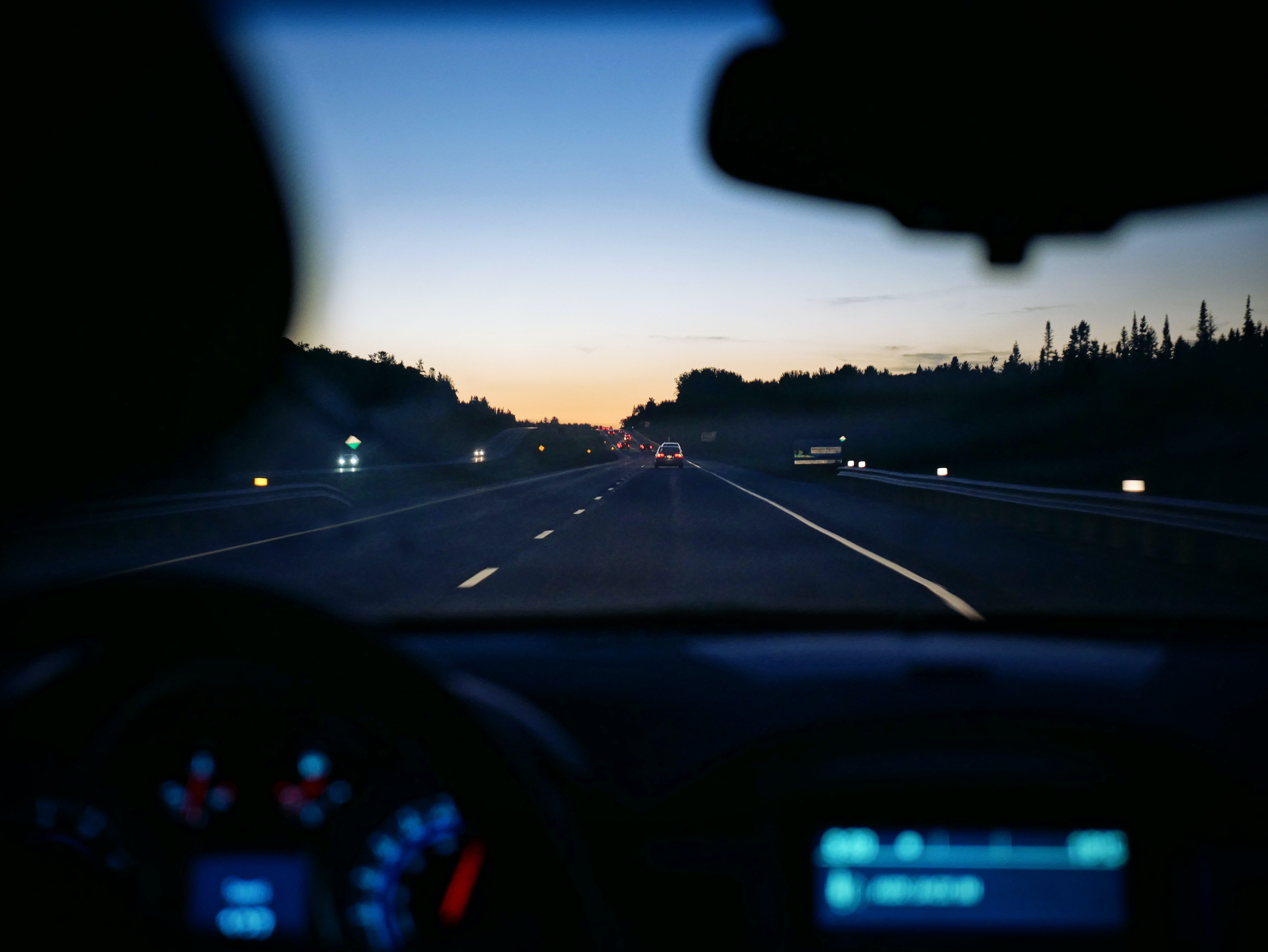 Car driving on a highway | Source: Unsplash 