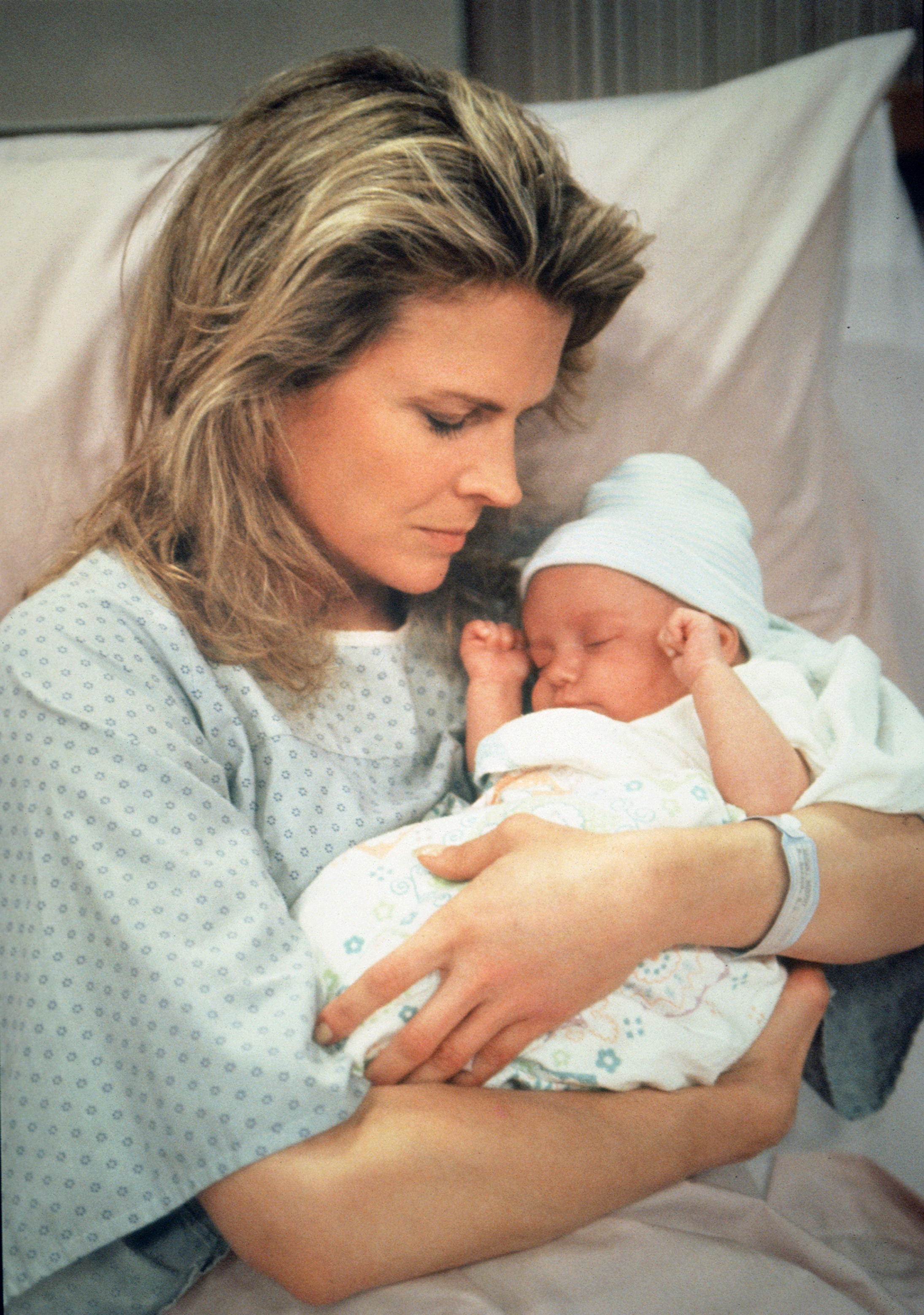 The actress as Murphy Brown, holding Baby Brown, in the episode "Birth 101" of "Murphy Brown," aired May 18, 1992 | Source: Getty Images