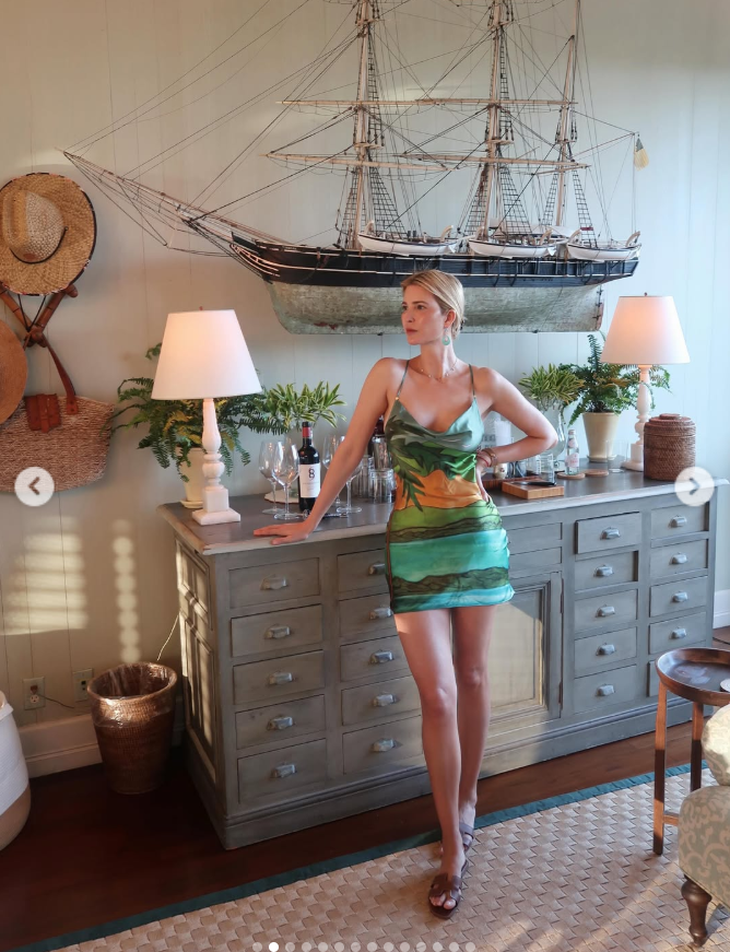 Ivanka Trump poses indoors in a tropical-print mini dress during Donald Trump Jr.’s wedding weekend celebration in the Bahamas. | Source: Instagram/ivankatrump