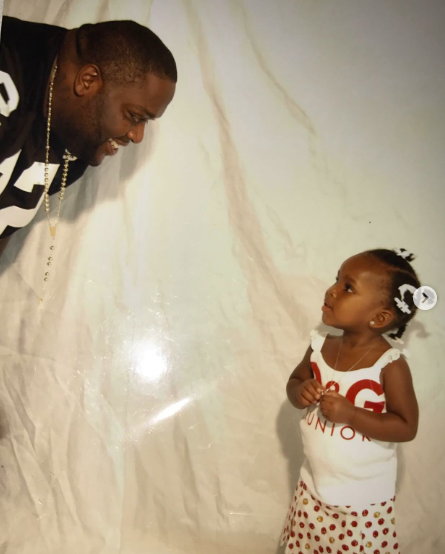 Rick Ross smiling at his daughter, Toie Roberts, posted on January 28, 2026. | Source: Instagram/t4ysav