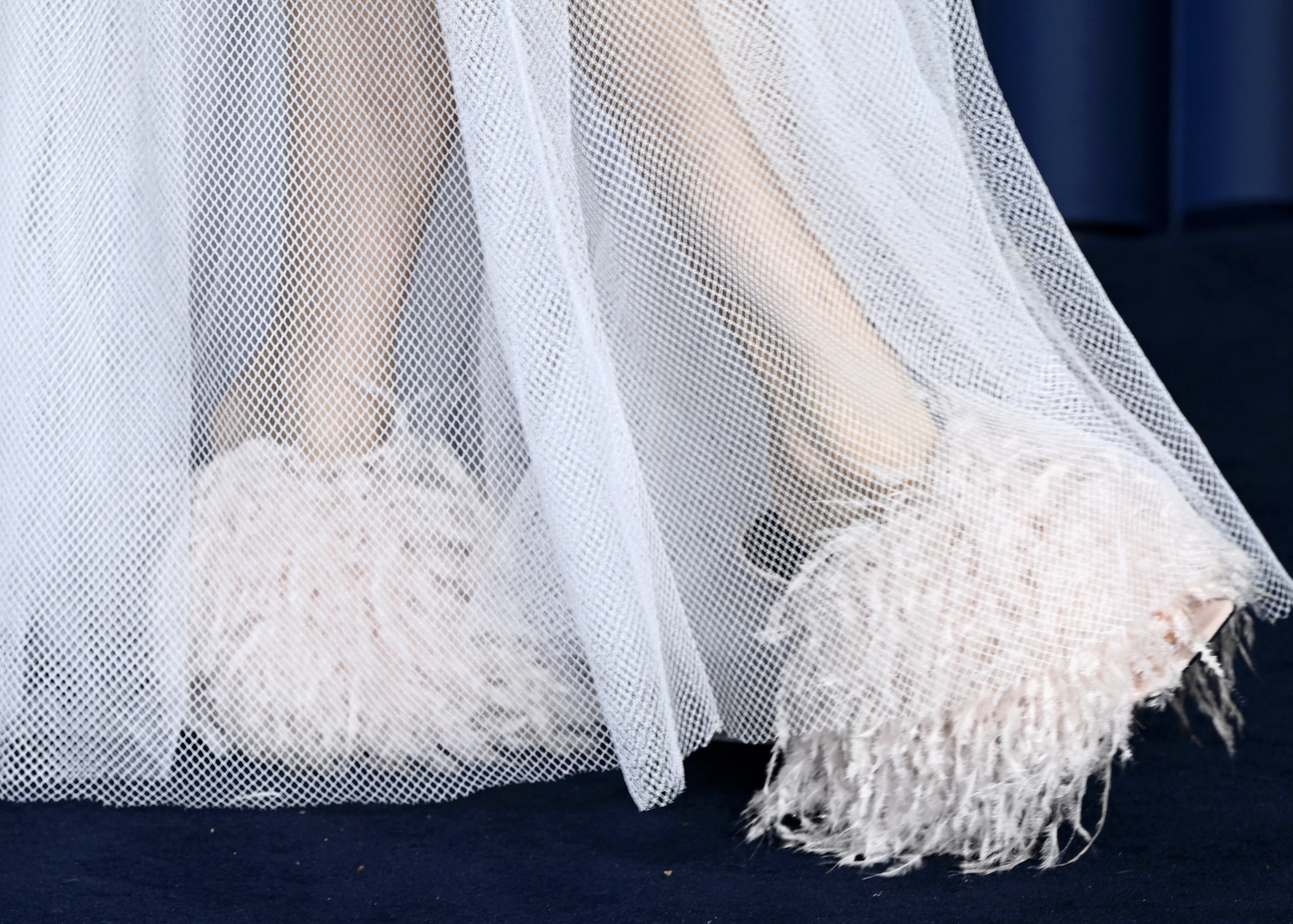 A close-up of Sienna Miller's shoes at The Fashion Awards at the Royal Albert Hall in London, England on December 1, 2025. | Source: Getty Images