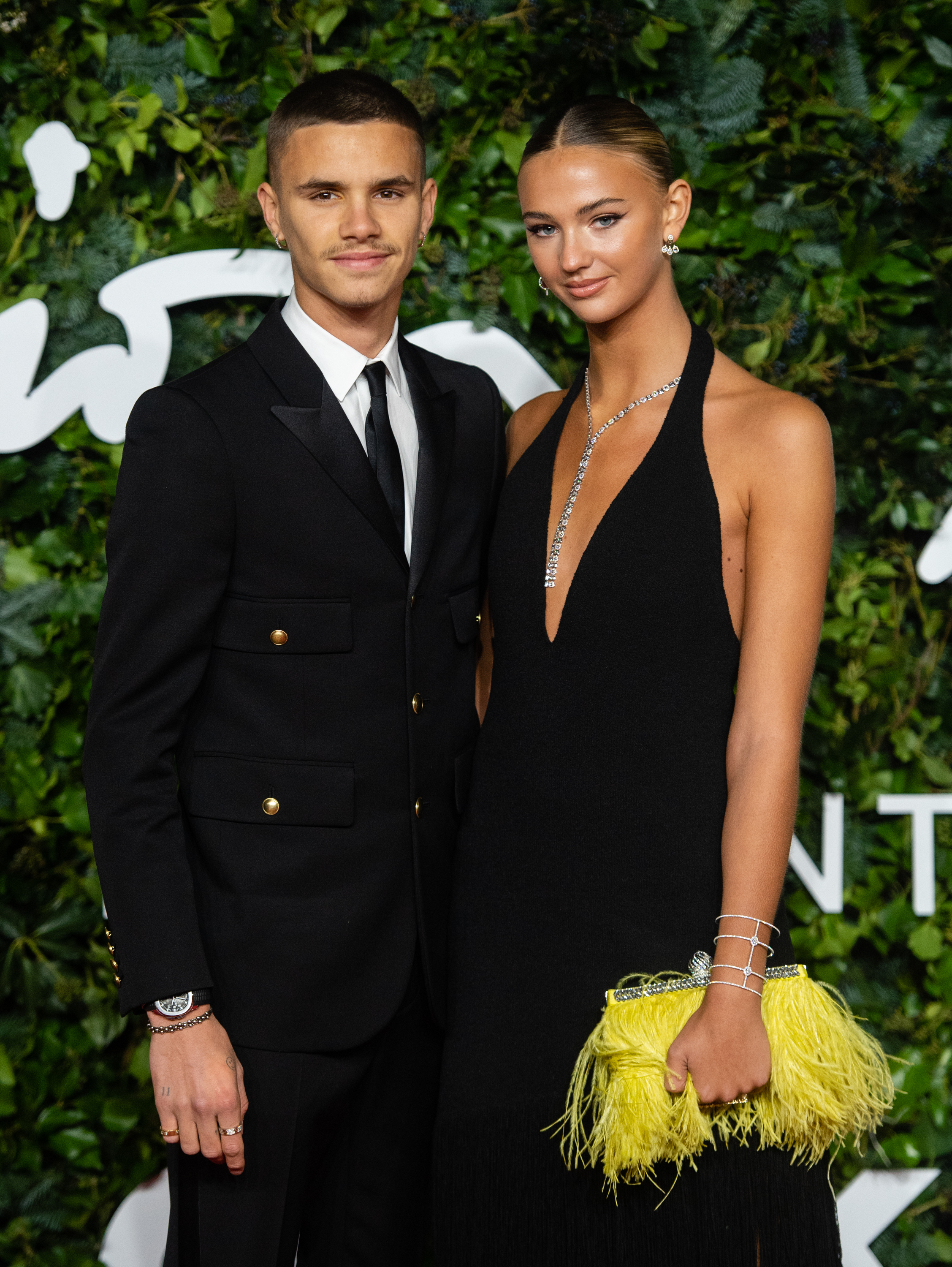 Romeo Beckham and Mia Regan at The British Fashion Awards in London, England, on November 29, 2021. | Source: Getty Images