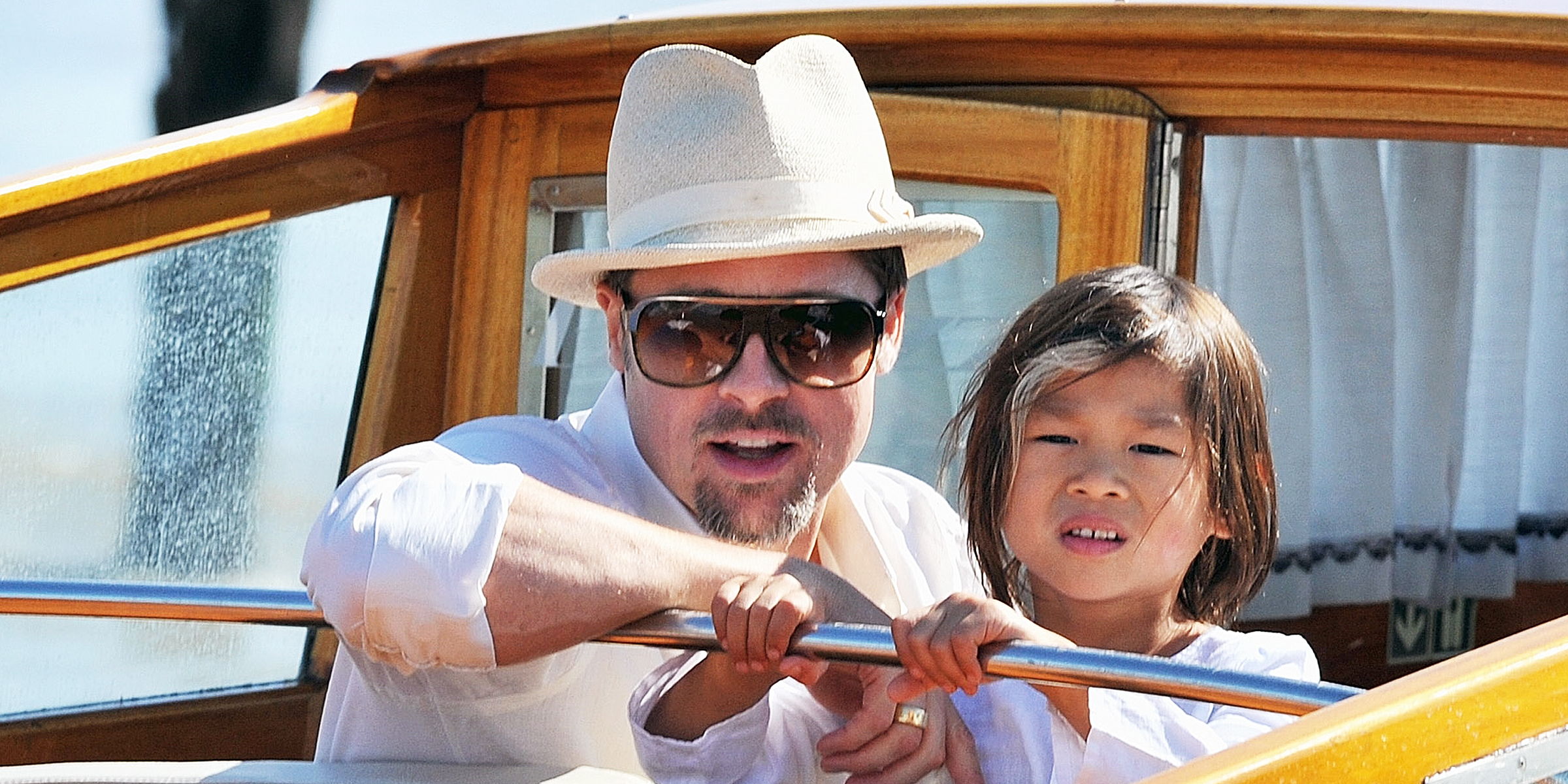 Brad Pitt und Pax Jolie-Pitt | Quelle: Getty Images