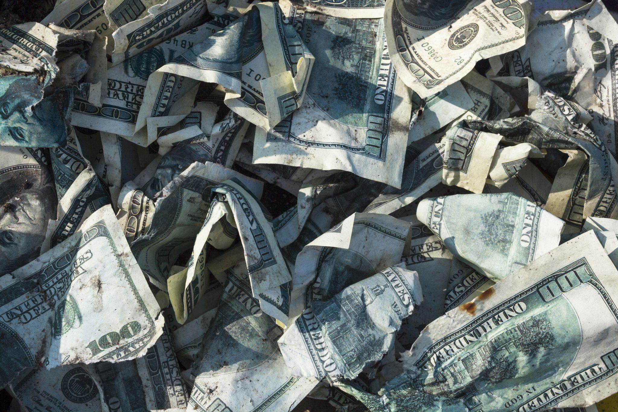 A bunch of dirty and scrunched up $1.00 bills. | Source: Shutterstock