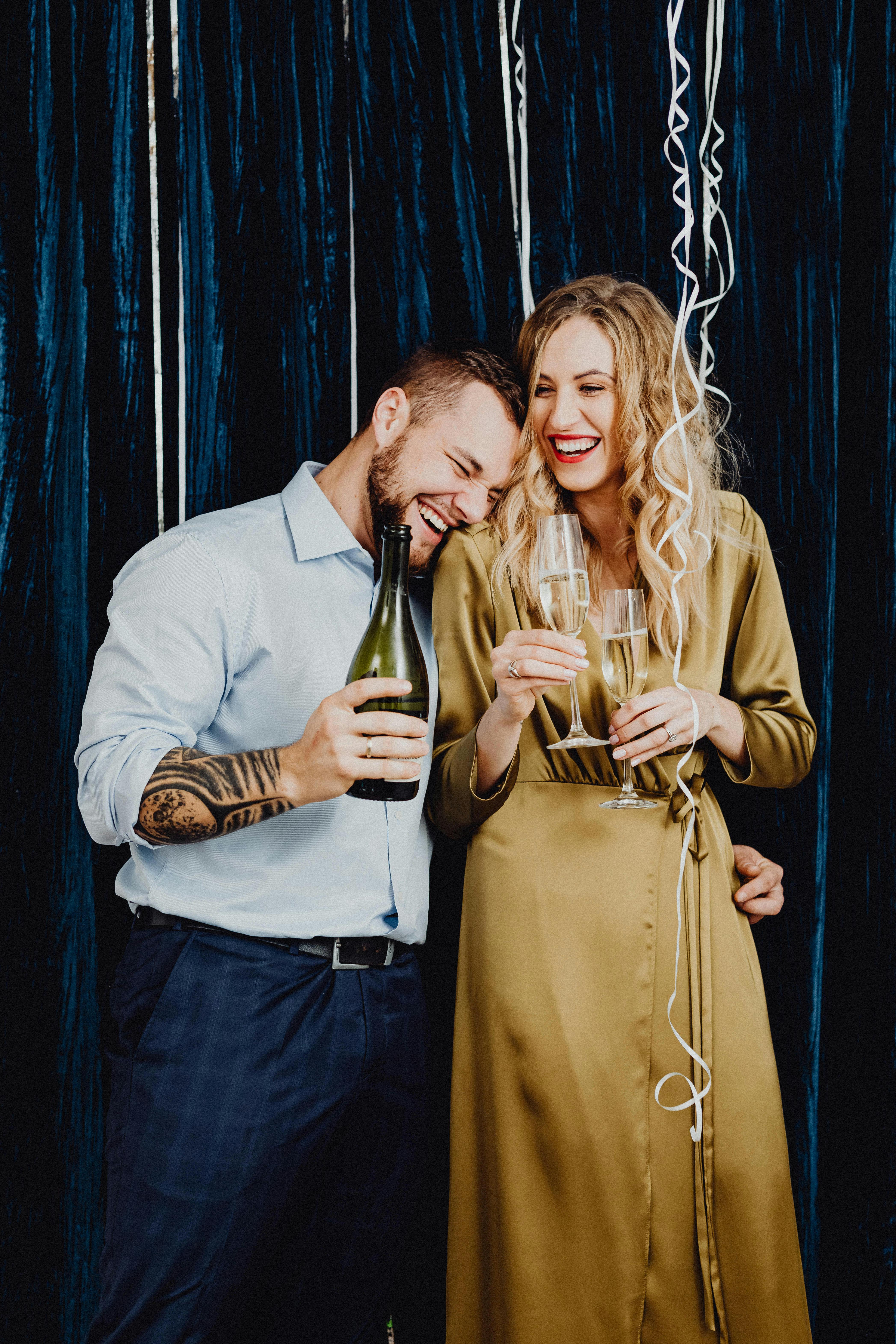 A happy couple at a party | Source: Pexels