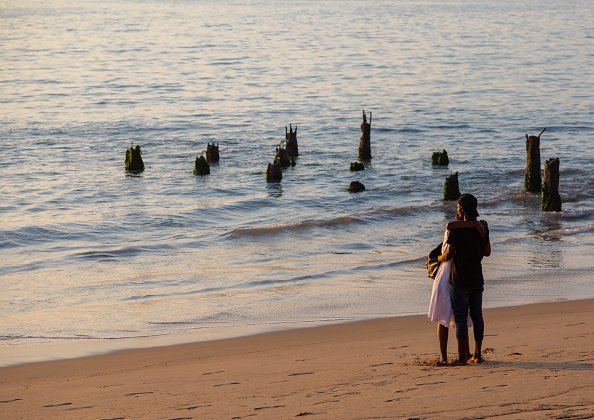 Photo of a couple on the beach | Image: Getty Images