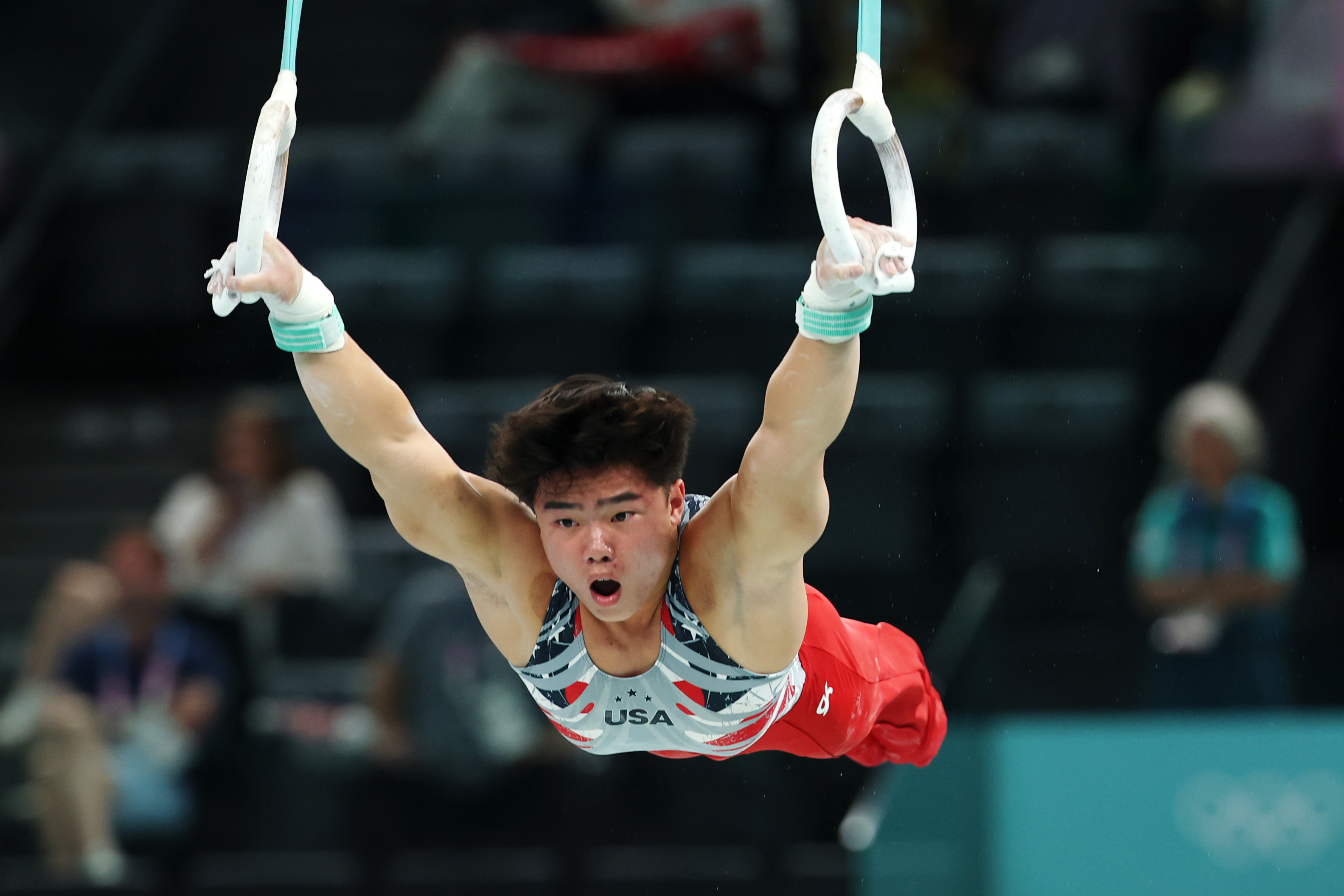 Asher Hong competes on the rings during the Men's Team Final at the Paris 2024 Olympics on July 29, 2024 | Source: Getty Images