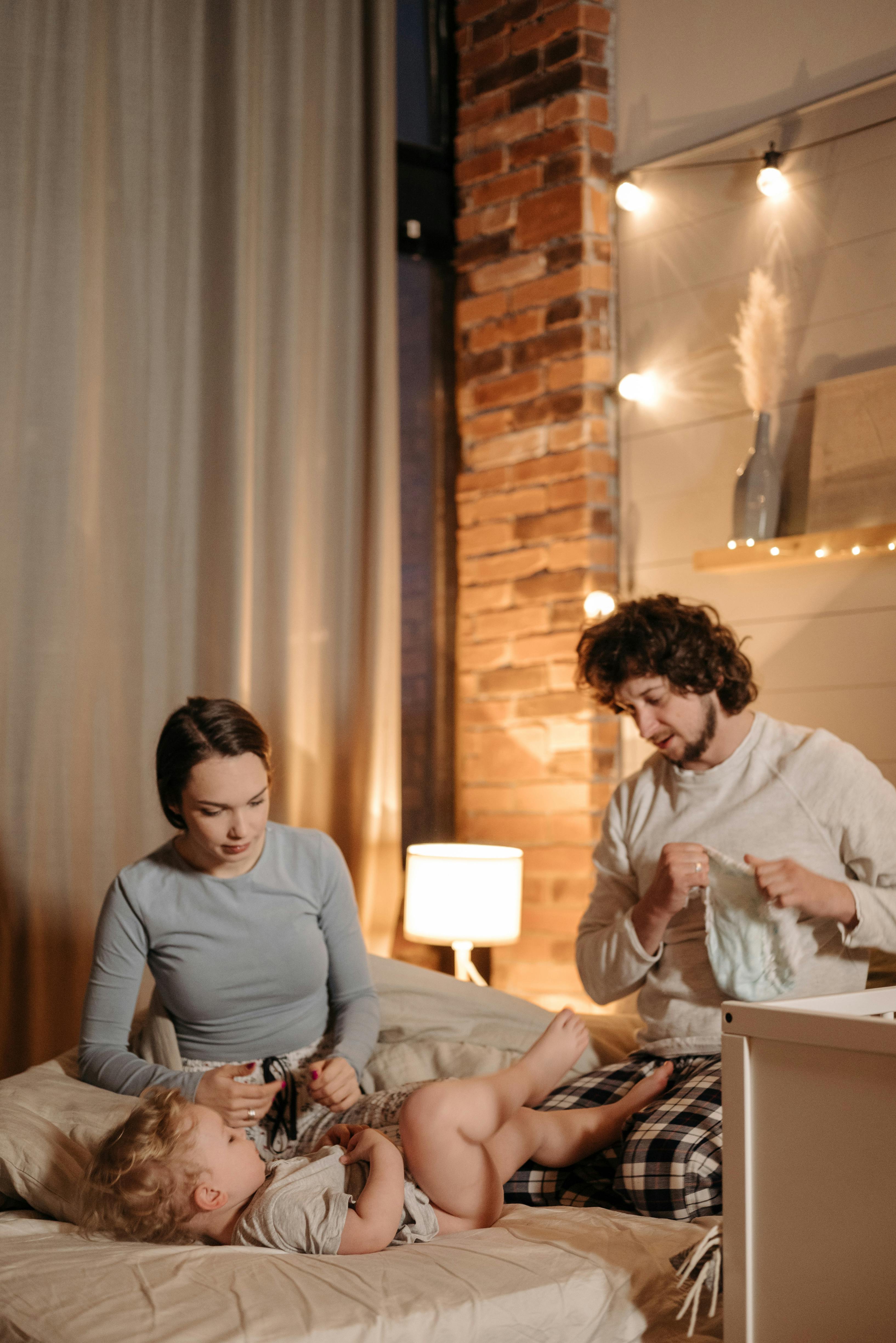 A couple with their child | Source: Pexels