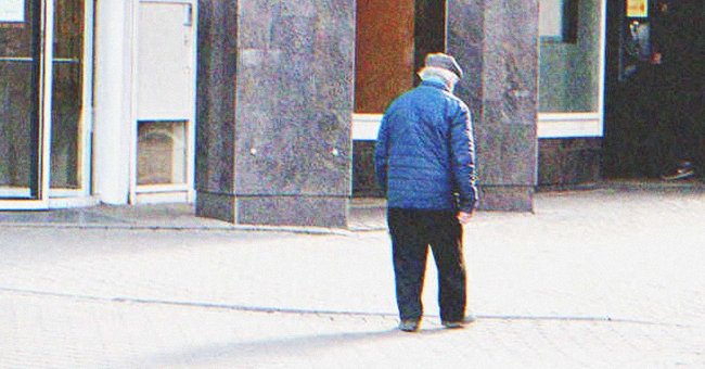 An old man walking down the street | Source: Shutterstock