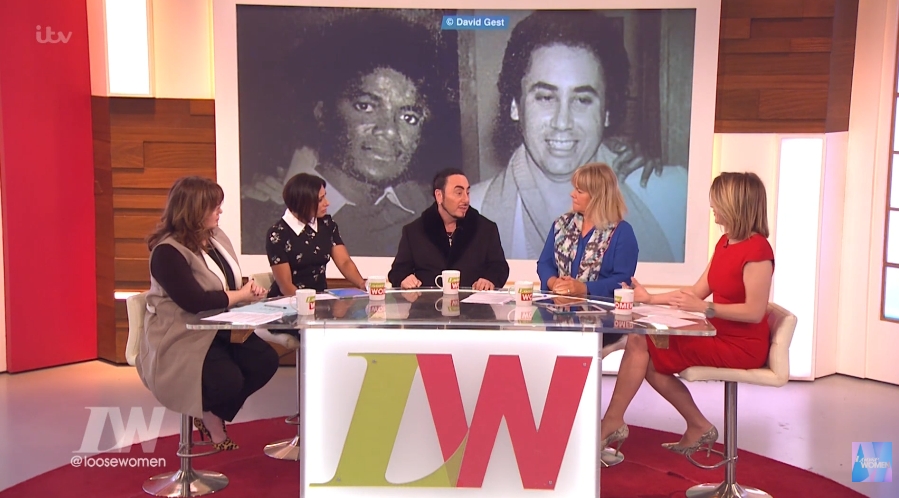 David Gest appeared on "Loose Women" in early 2016, where a rare photo of him alongside longtime friend Michael Jackson was displayed behind the panel. The throwback image showed the pair years before Gest underwent the cosmetic procedures he later said Jackson had encouraged him to consider. The moment was captured in a video dated January 26, 2016. | Source: YouTube/Loose Women
