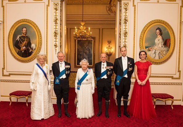 Camilla, Prince Charles, Queen Elizabeth II, Prince Philip, Prince William, and Catherine at Buckingham Palace on December 8, 2016 | Photo: Getty Images