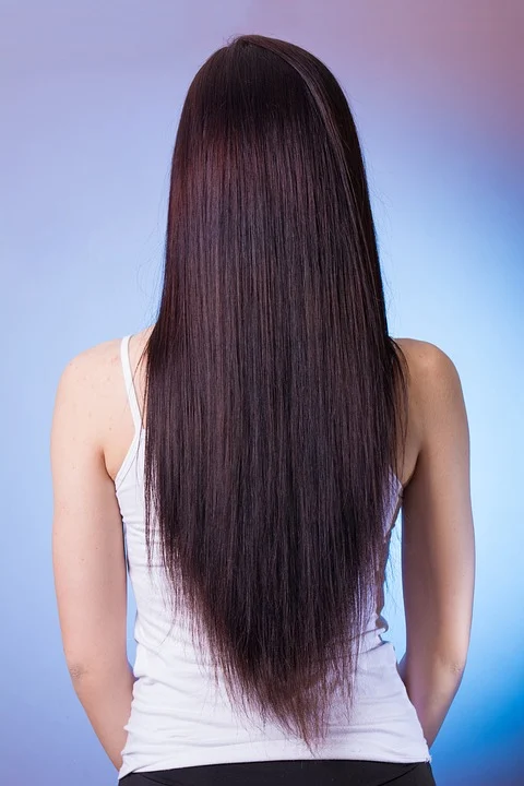 Une femme aux cheveux lisses. | Photo : Getty Images Une femme aux cheveux lisses. | Photo : Getty Images