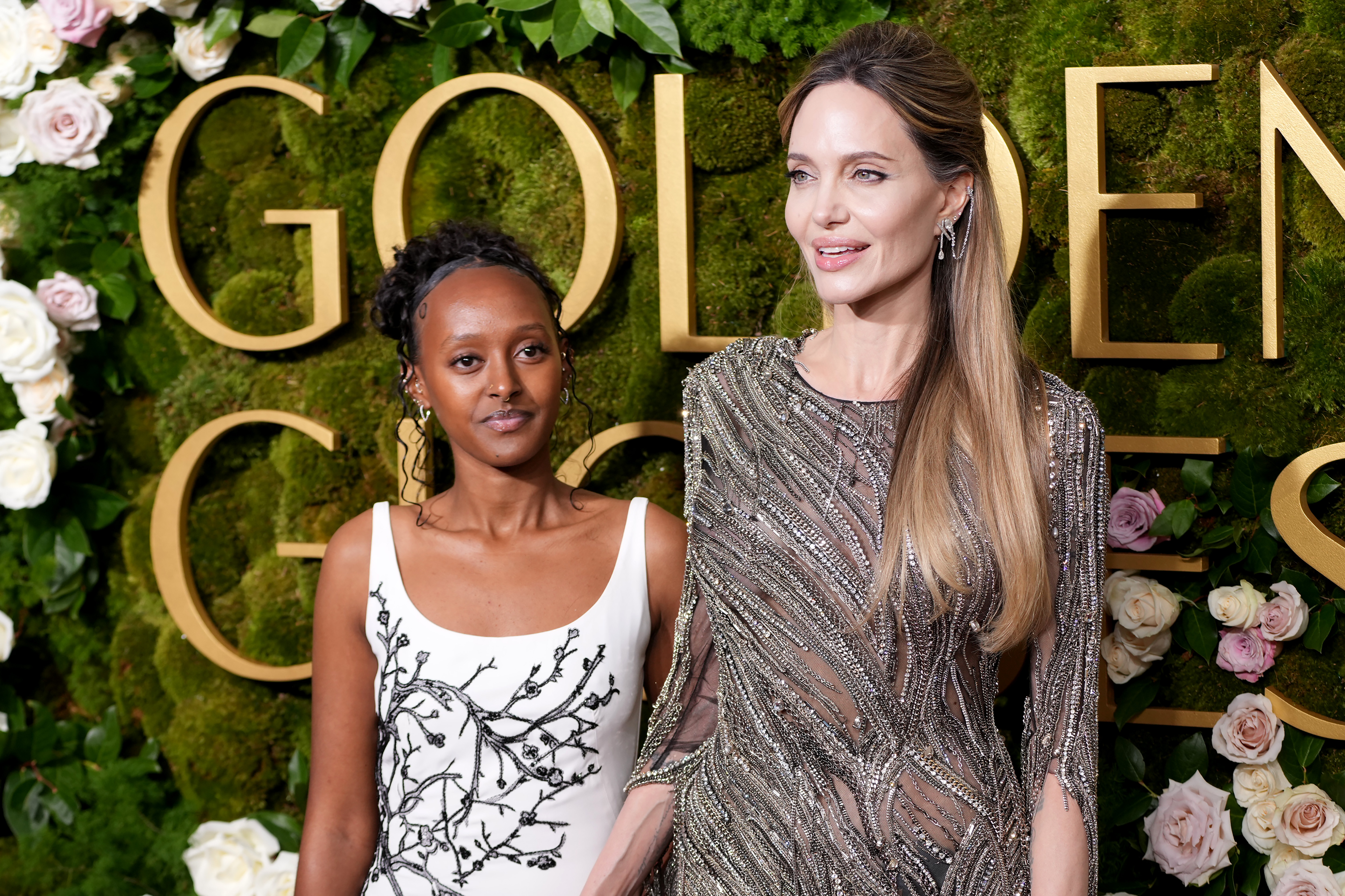 Zahara Jolie and Angelina Jolie attend the 82nd Annual Golden Globe Awards at The Beverly Hilton on January 5 in Beverly Hills, California. | Source: Getty Images