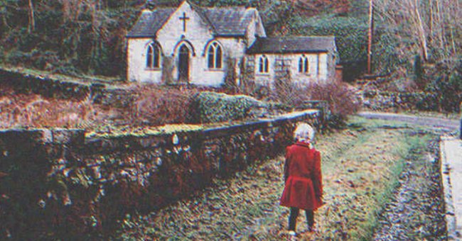 A little girl walking to a church | Source: Shutterstock