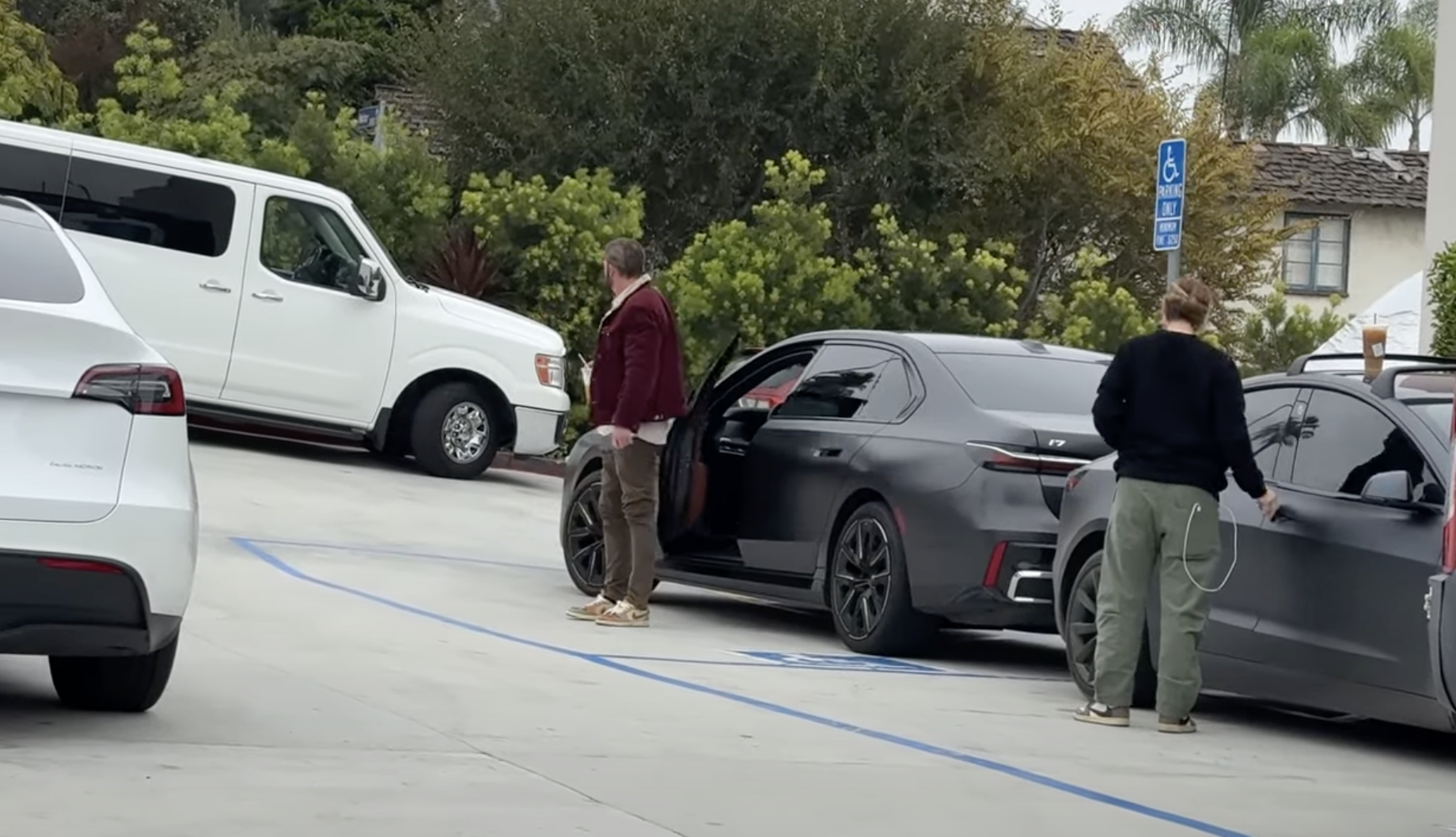 Ben Affleck, with an iced coffee in hand, and Gigi Fouquet arrive for work, from a post dated October 15, 2024 | Source: Youtube/@x17online