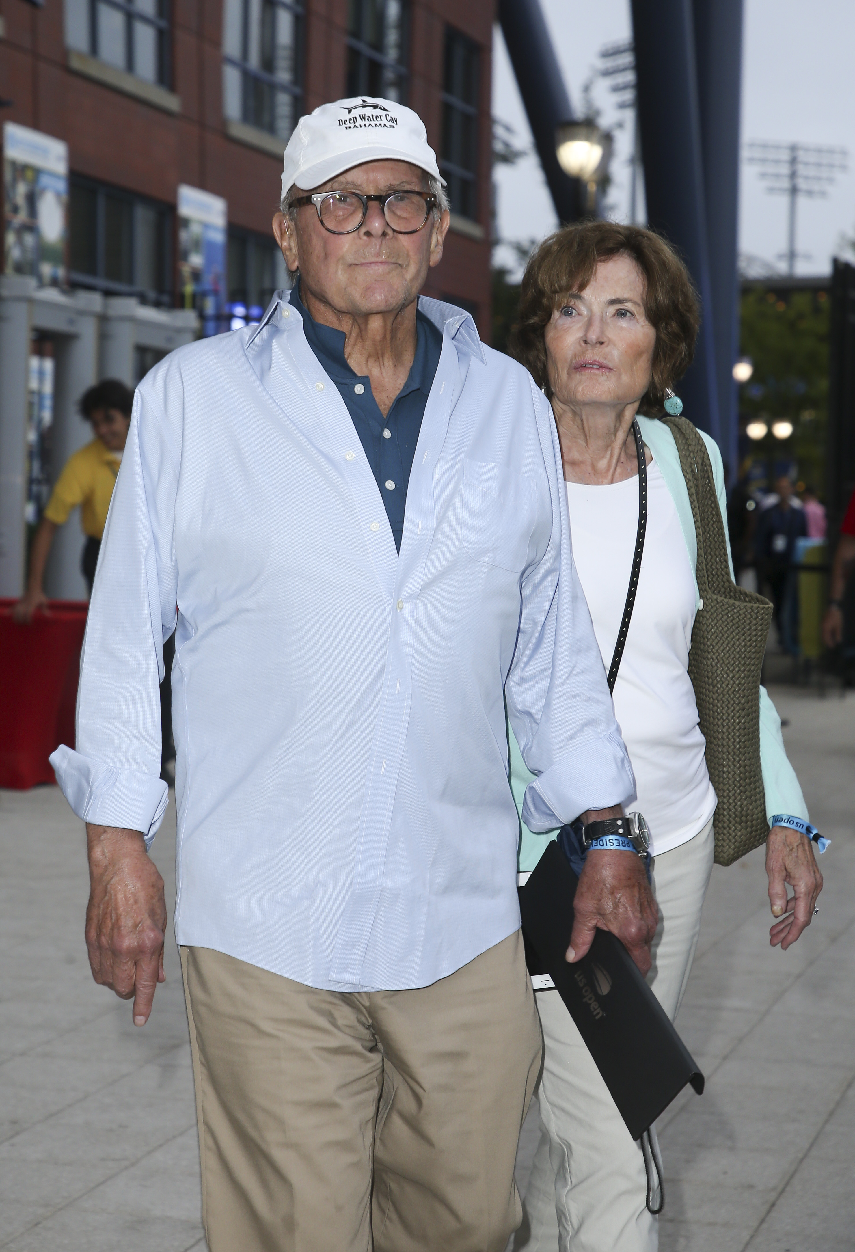 Tom Brokaw and Meredith Auld on day 12 of the US Open Men's Semifinals at the USTA Billie Jean King National Tennis Center on September 7, 2018, in Flushing Meadows, Queens, New York City | Source: Getty Images