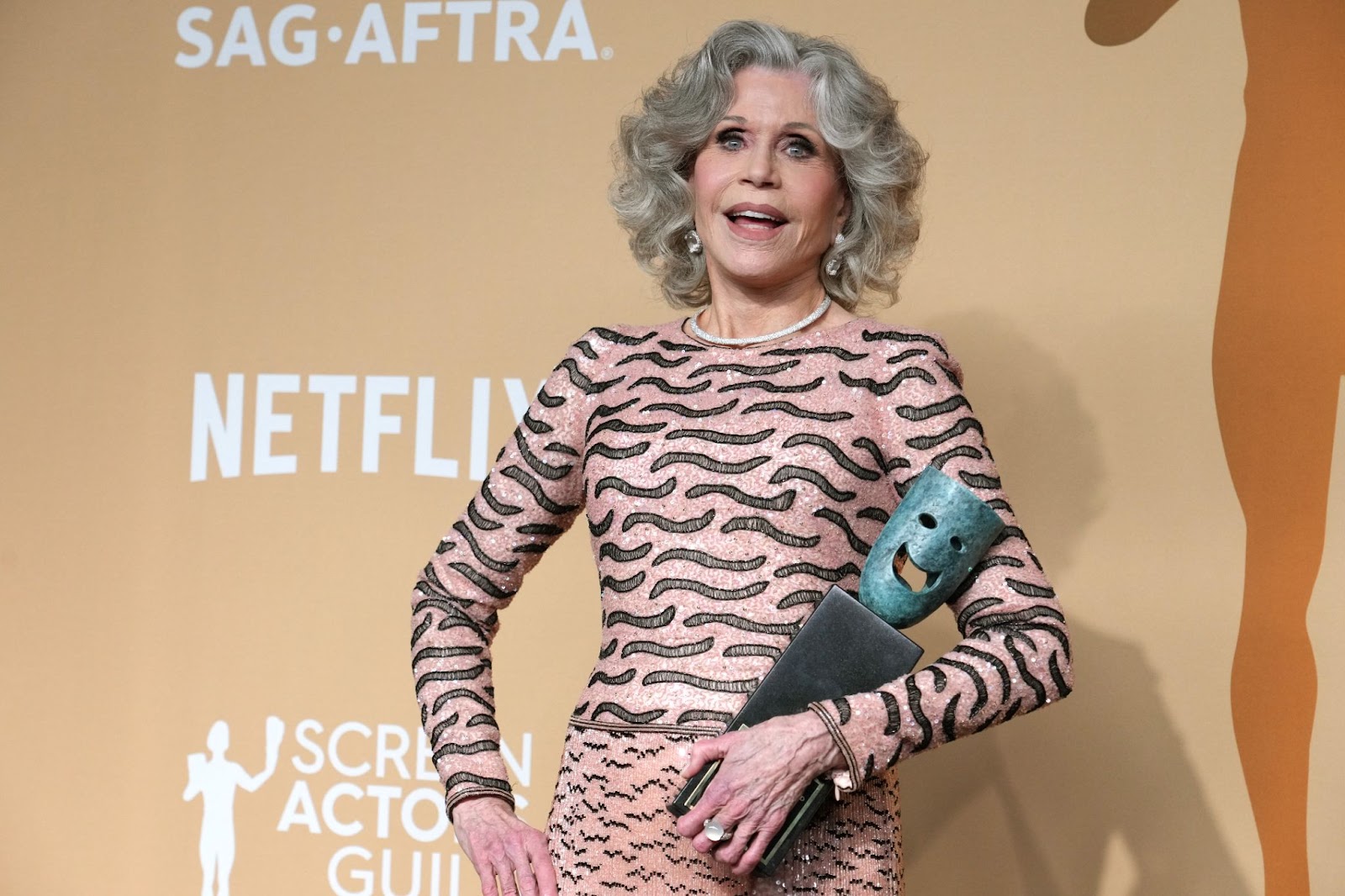 Jane Fonda holding the SAG Life Achievement Award in the press room during the 31st Annual Screen Actors Guild Awards | Source: Getty Images