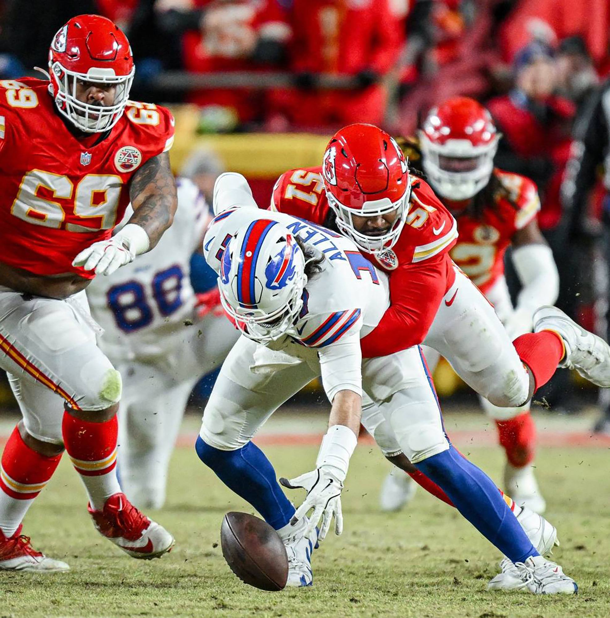 Kansas City Chiefs defensive end Mike Danna forces Buffalo Bills quarterback Josh Allen to drop the ball in the second quarter during the AFC Championship Game on January 26, 2025 | Source: Getty Images