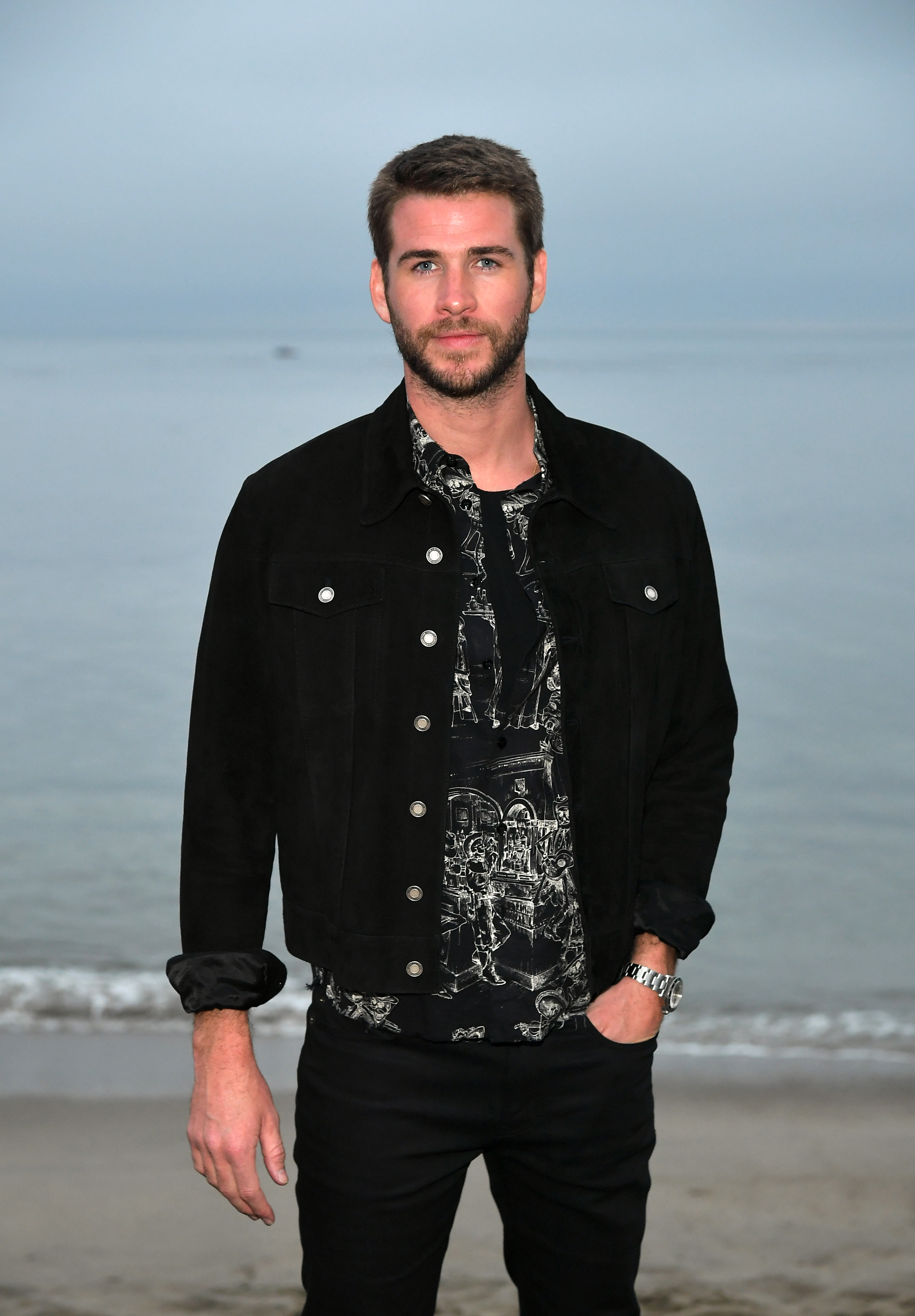 Liam Hemsworth attends the Saint Laurent Mens Spring Summer 20 Show in Paradise Cove Malibu, California, on June 6, 2019 | Source: Getty Images