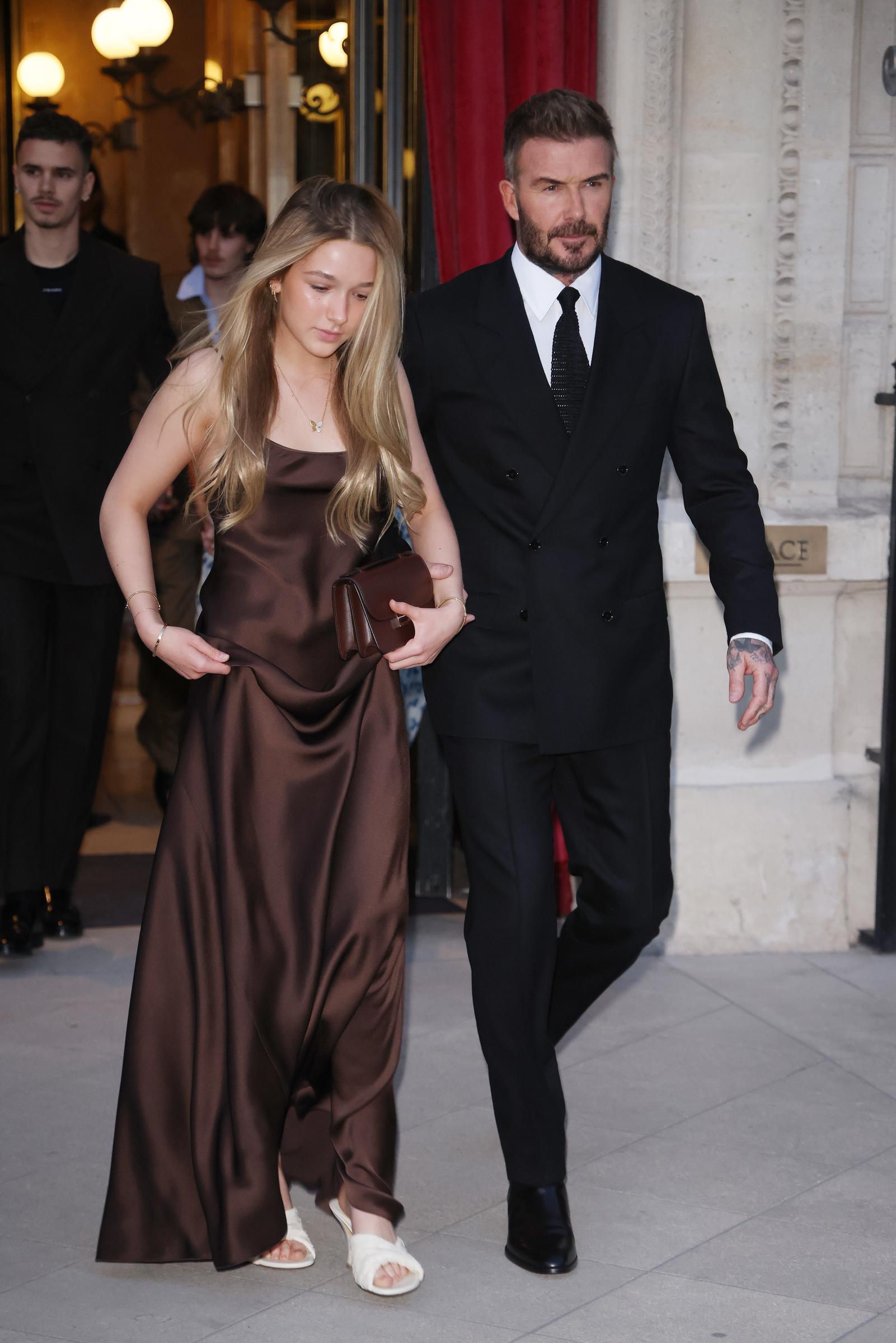 David and Harper Beckham leaving their hotel to head to the Victoria Beckham show during the Womenswear Fall/Winter 2025/2026 as part of Paris Fashion Week on March 7, 2025, in Paris, France | Source: Getty Images