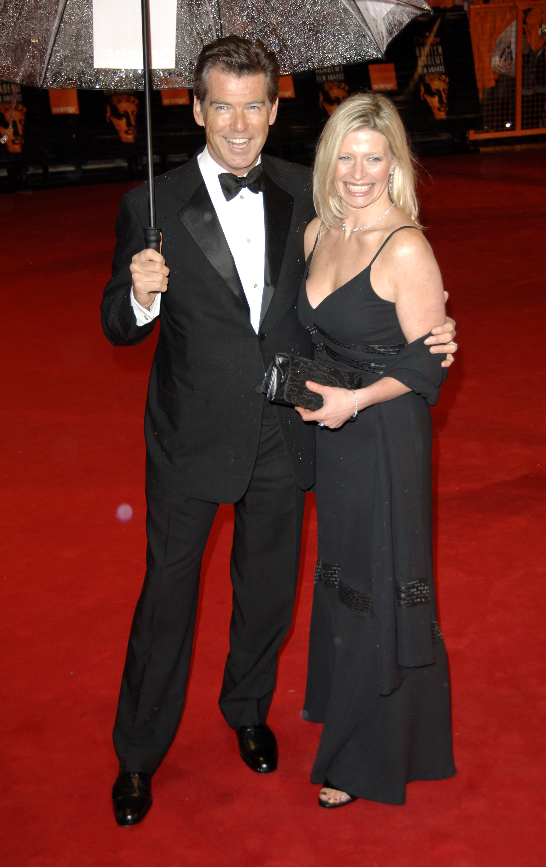 Pierce Brosnan and Charlotte at The Orange British Academy Film Awards in 2006 | Source: Getty Images 
