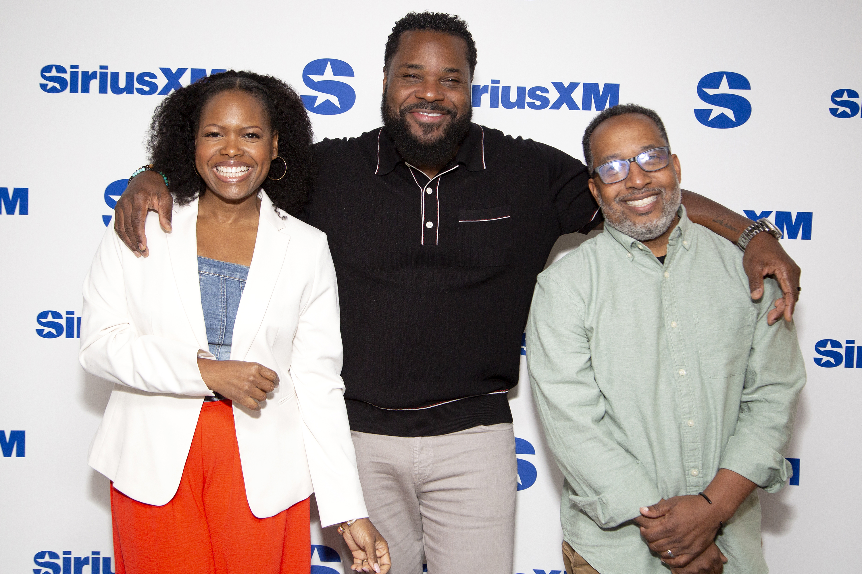 Candace Kelley, Malcolm-Jamal Warner, and Weusi Baraka visit SiriusXM Studios on June 11, 2024, in New York City | Source: Getty Images