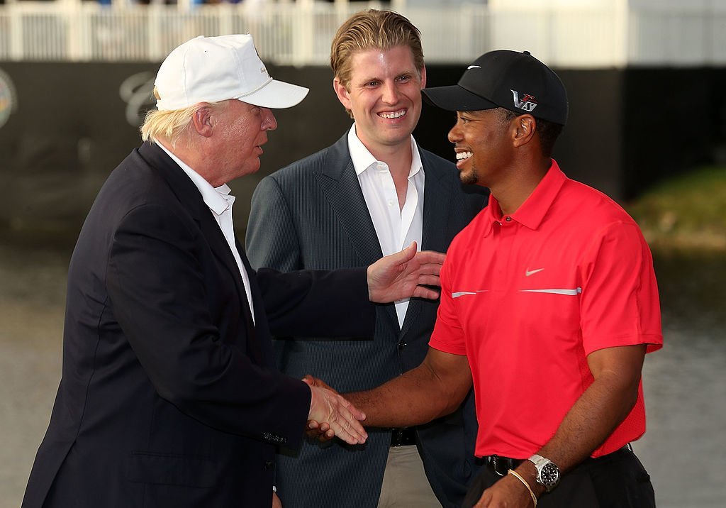 Donald Trump greets Tiger Woods after the final round of the World Golf Championships, 2013. | Photo: GettyImages